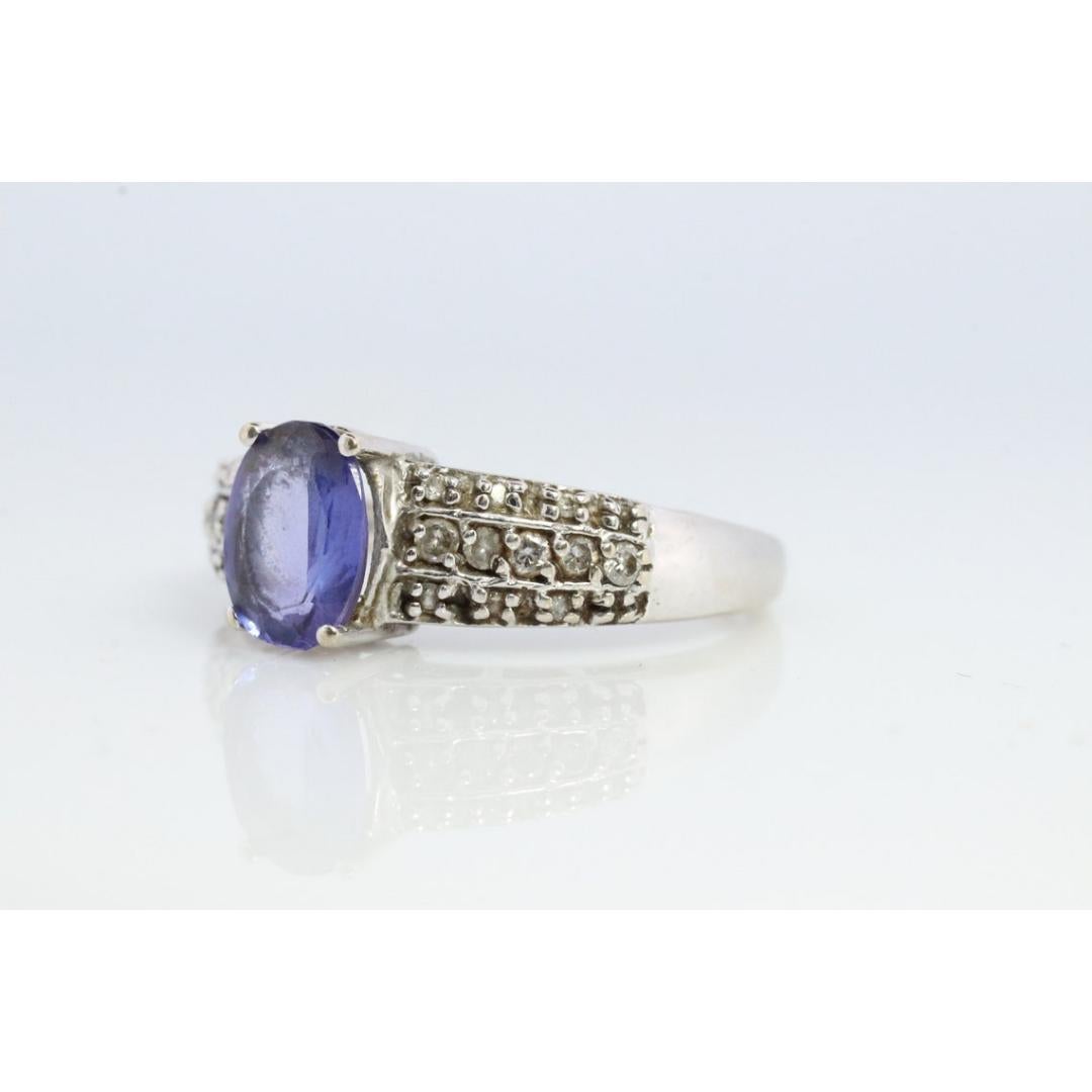 Tanzanite and diamond ring. 14k Blue Tanzanite solitaire. For Sale 2