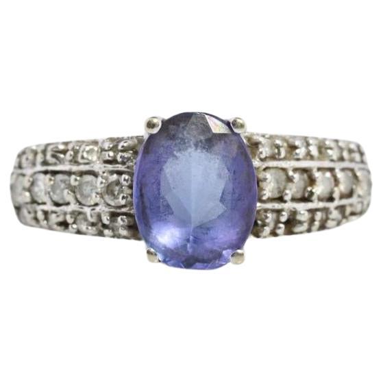 Tanzanite and diamond ring. 14k Blue Tanzanite solitaire.
