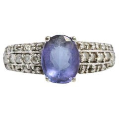 Anillo de tanzanita y diamantes. Solitario de tanzanita azul de 14k.