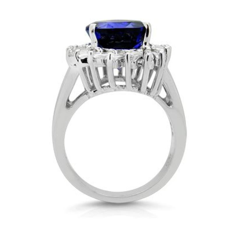 18k White Gold 7.45ct Tanzanite and 1.31ct Diamond Ring

The finest quality Tanzanite, mined from the foothills of Mount
Kilimanjaro, exhibits a rich purplish blue. Takat uses only the best
examples of this hue to take center stage in each