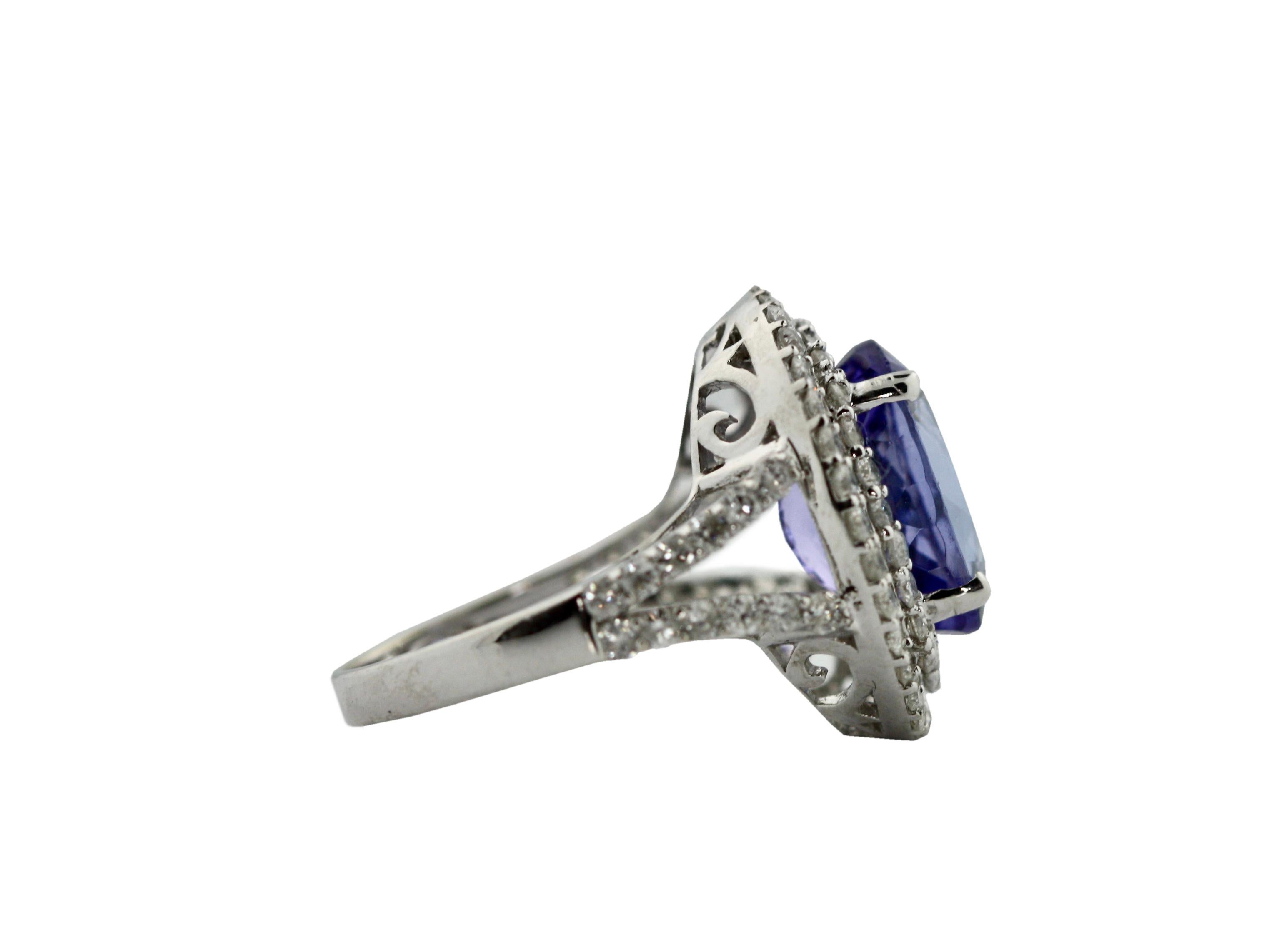 
Tanzanite and Diamond Ring 
mounted in 14kt white gold, size 7
Accompanied by AIGL Appraisal K45E11-EA13275 
Stating: 
14K Gold Tanzanite and Diamond Ring One polished, stamped, and tested 14K white gold ring with a bright finish, mounted with 1