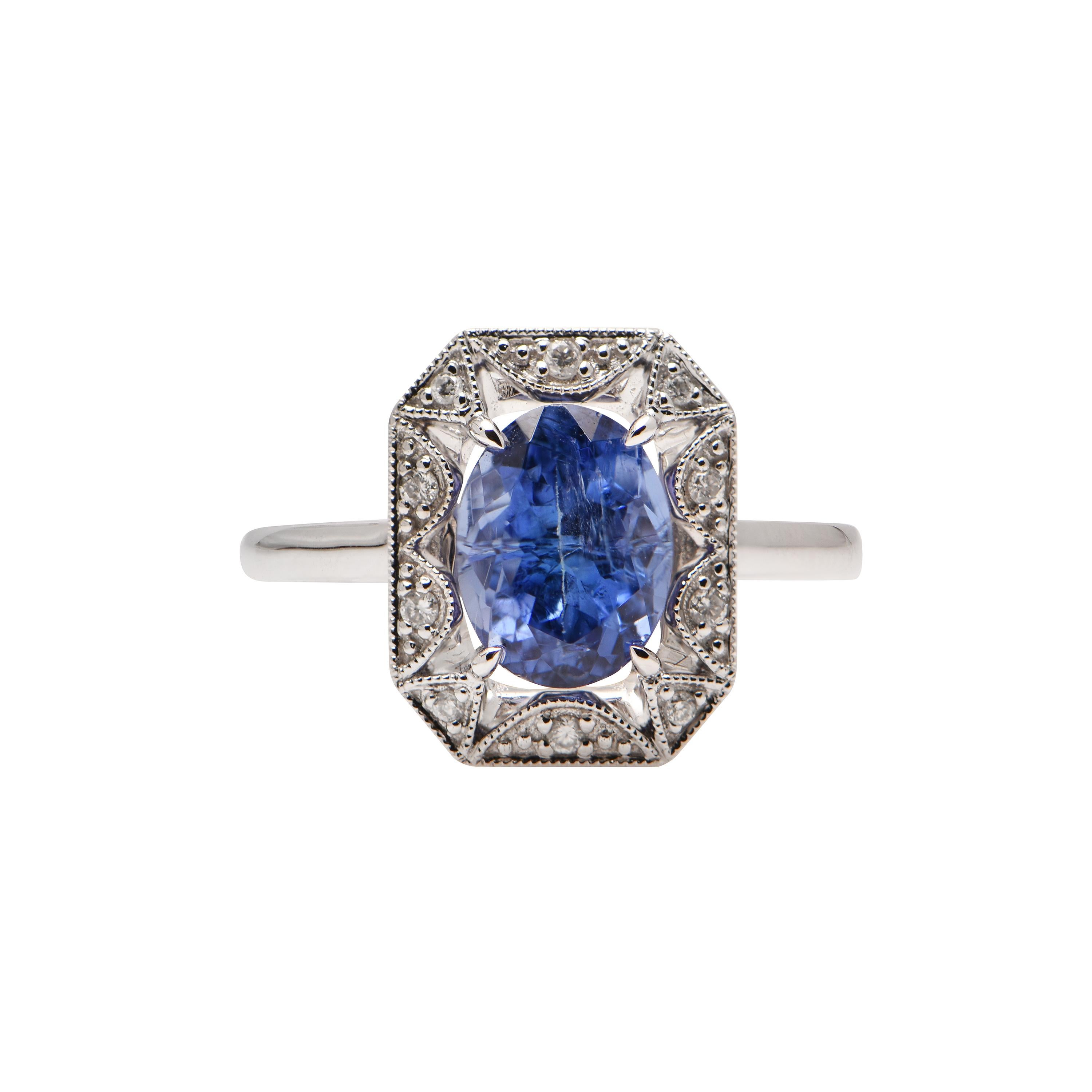 An 18ct White Gold ring showcasing a Tanzanite (2.26ct), and 10 Diamonds totalling 0.08ct. This ring comes with a valuation certificate.