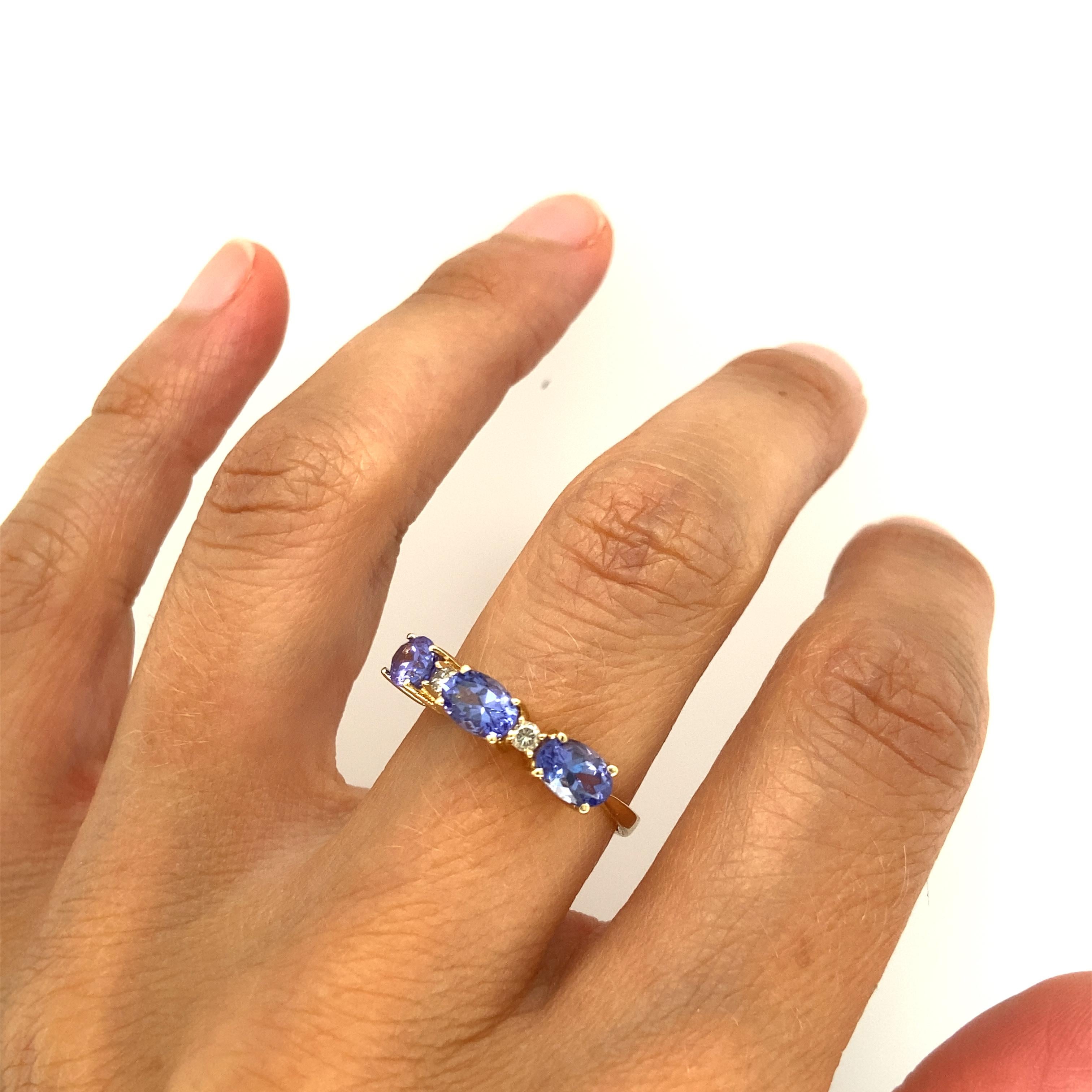 Oval Cut Tanzanite and Diamond Ring