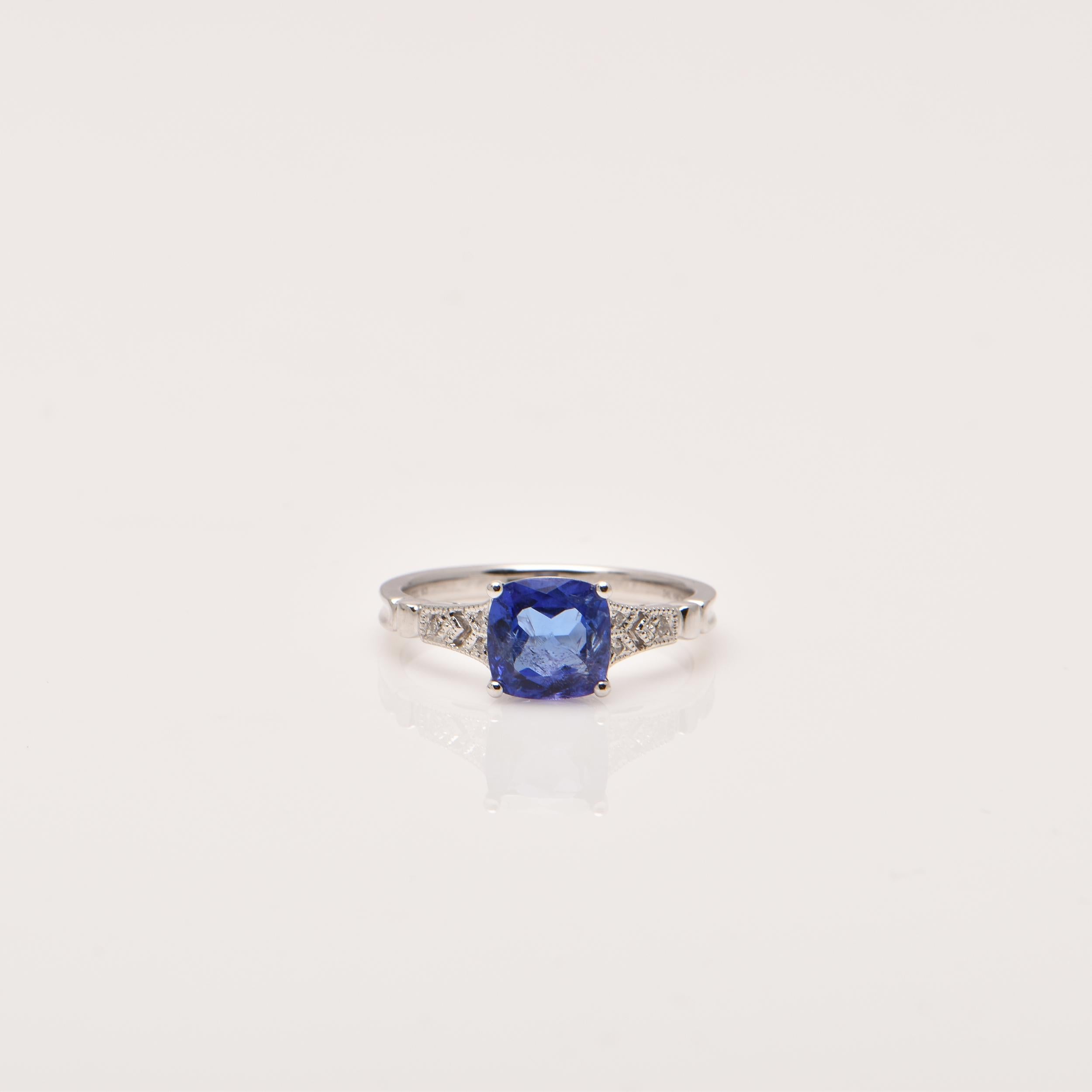 Modern Tanzanite and Diamond Ring For Sale
