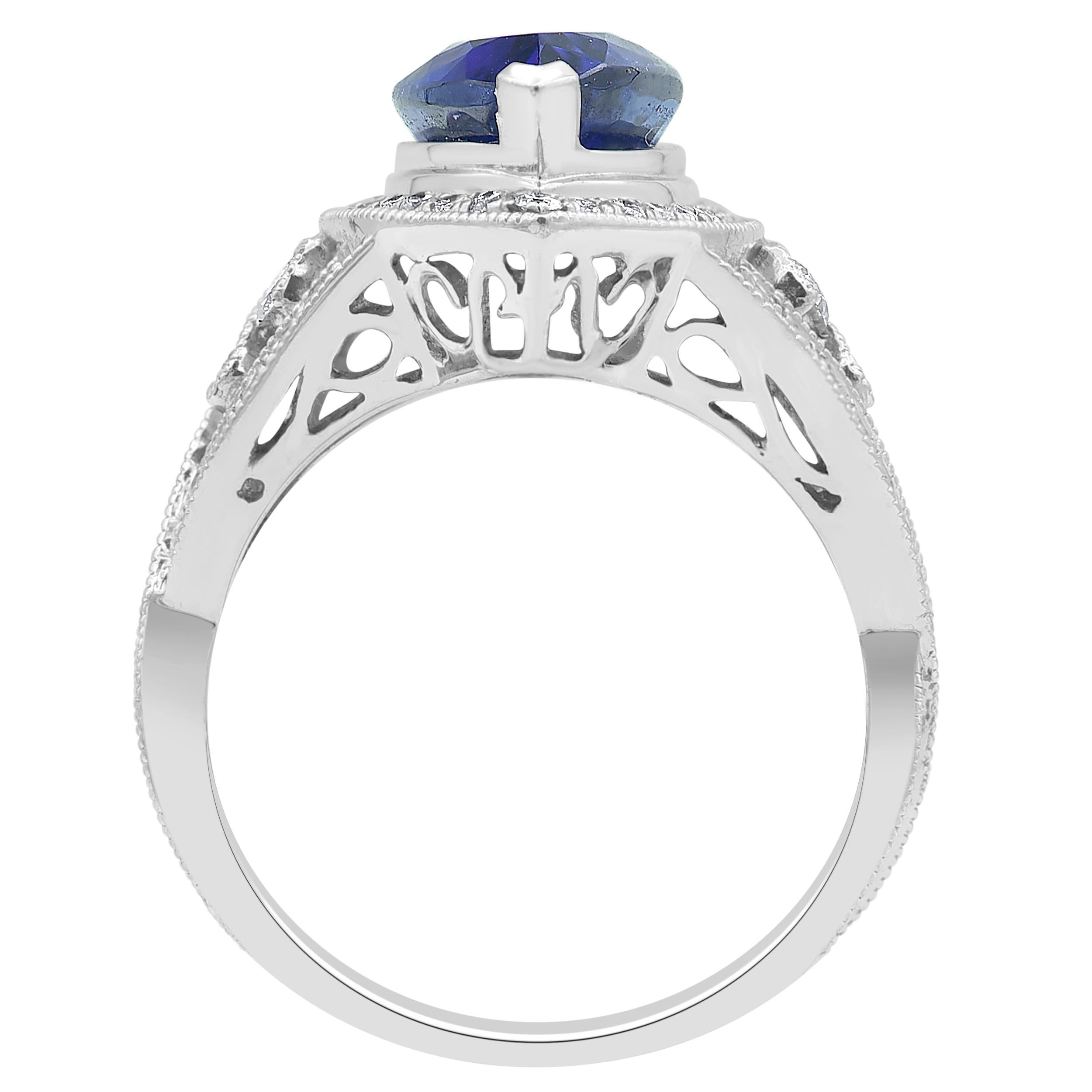 Pear Cut Tanzanite and Diamond Ring in 14k White Gold For Sale