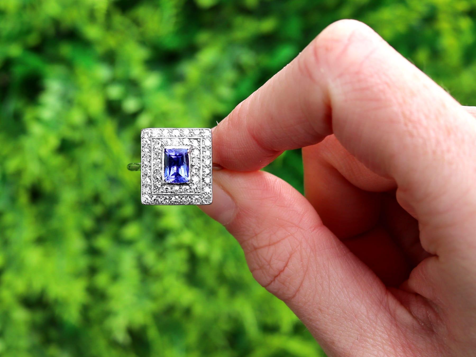 An impressive vintage 1940s 18 karat white gold and platinum set, 0.98 carat diamond cocktail ring set with a vintage 1990s 0.78 carat tanzanite ; part of our jewelry collections.

This fine and impressive vintage tanzanite ring has been crafted in