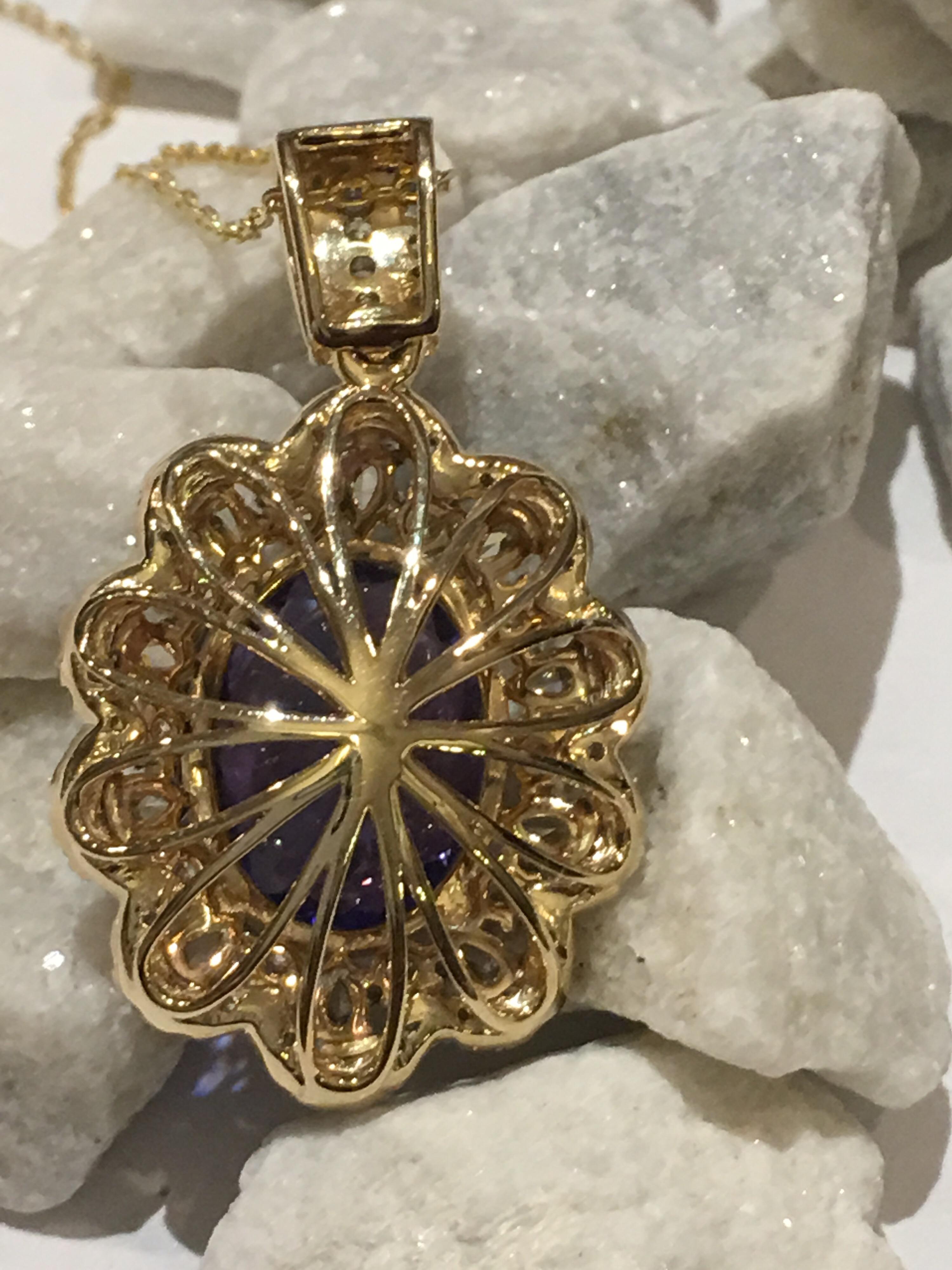 Artisan Tanzanite and Diamonds Set in 14 Karat Gold Pendant with Yellow Gold chain