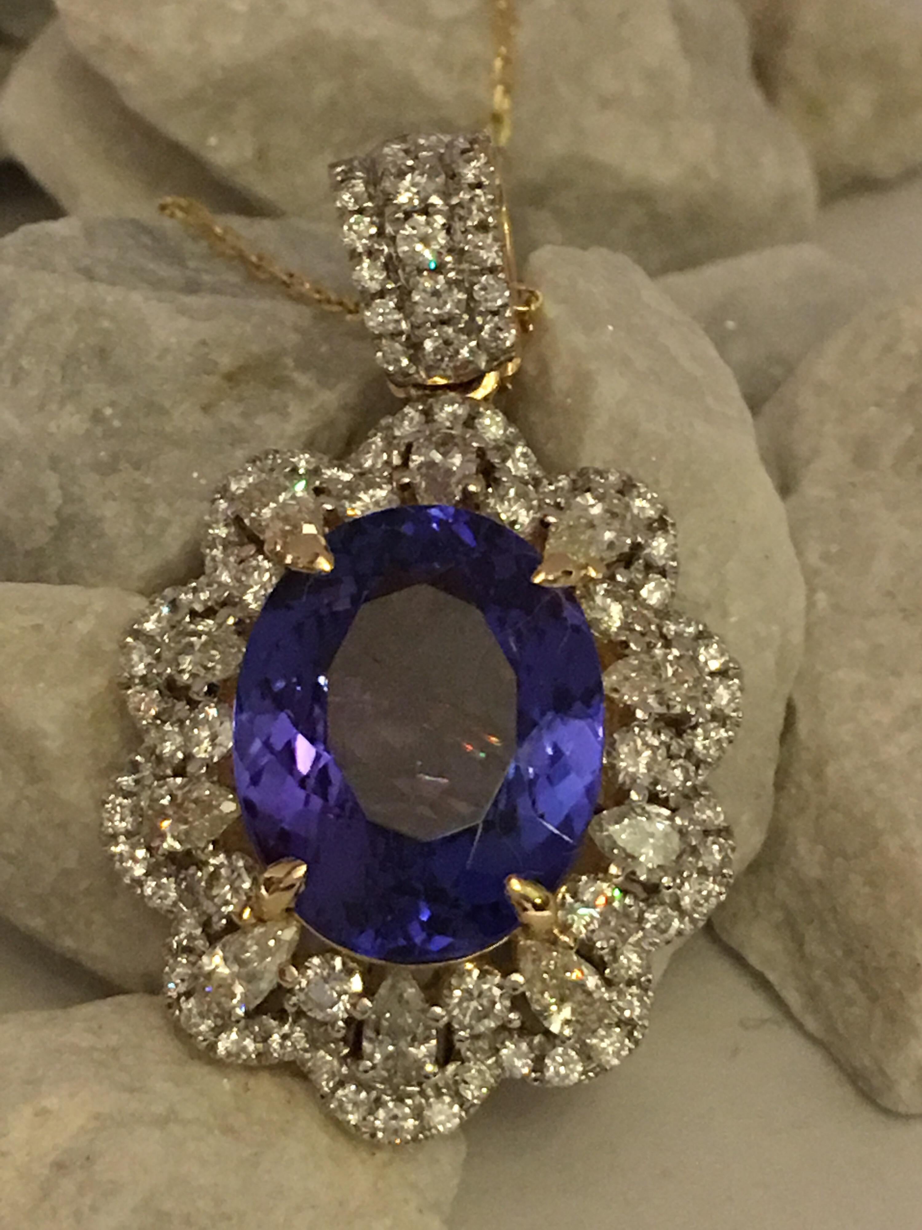 Oval Cut Tanzanite and Diamonds Set in 14 Karat Gold Pendant with Yellow Gold chain