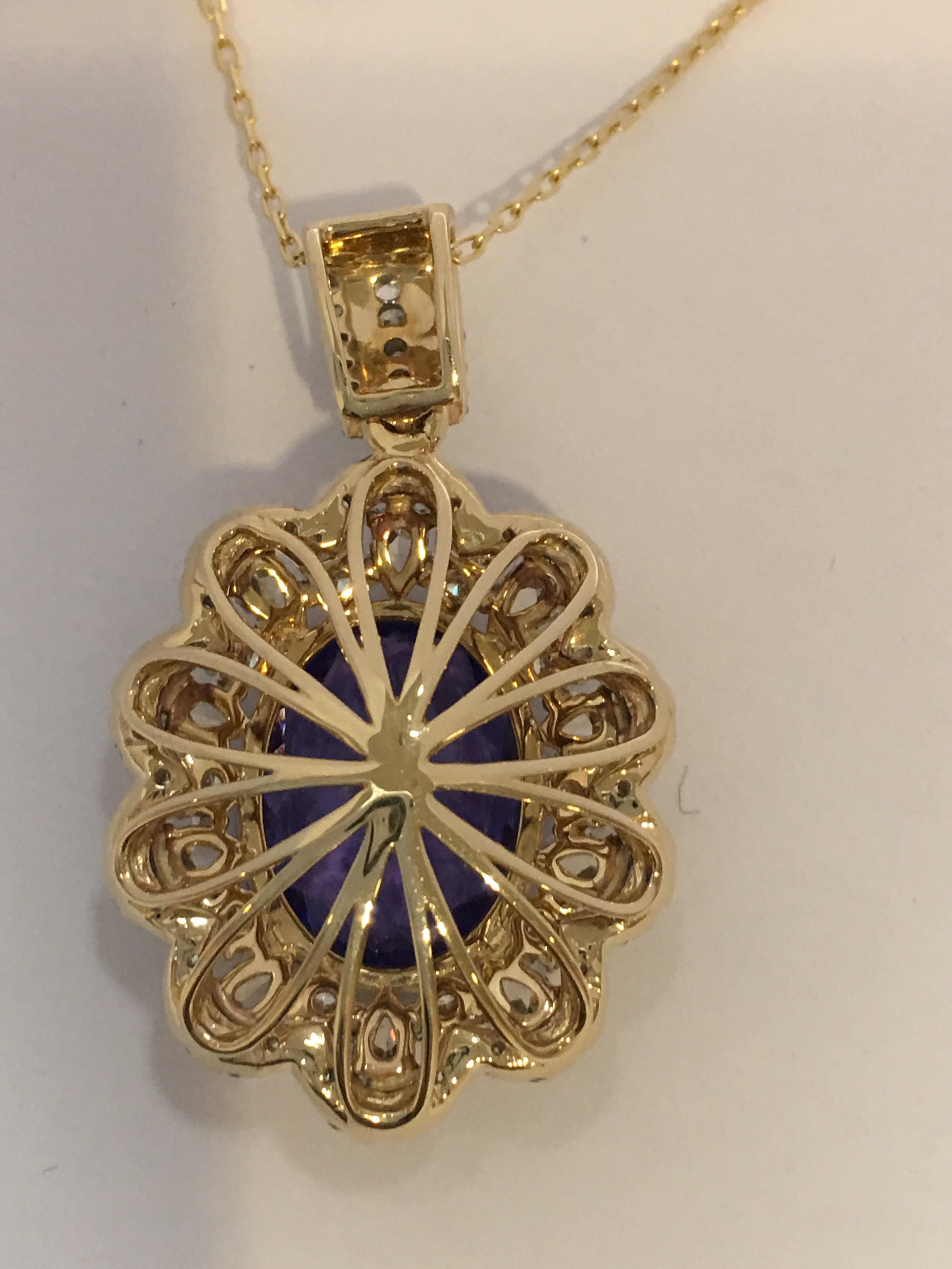 Tanzanite and Diamonds Set in 14 Karat Gold Pendant with Yellow Gold chain In New Condition In Trumbull, CT