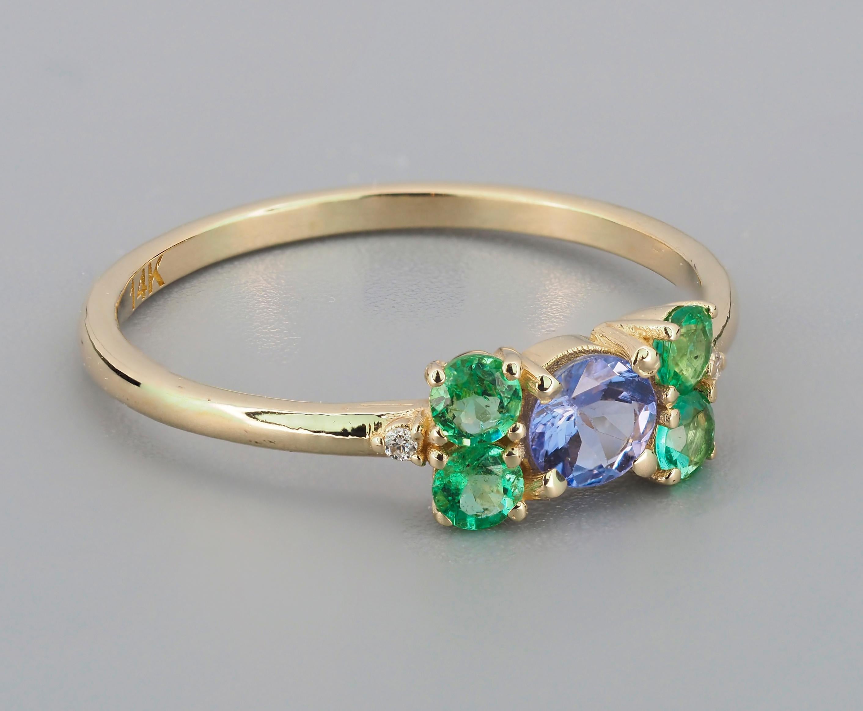 Modern Tanzanite and emeralds 14k gold ring. Round tanzanite gold ring. 