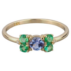 Tanzanite and emeralds 14k gold ring. Round tanzanite gold ring. 
