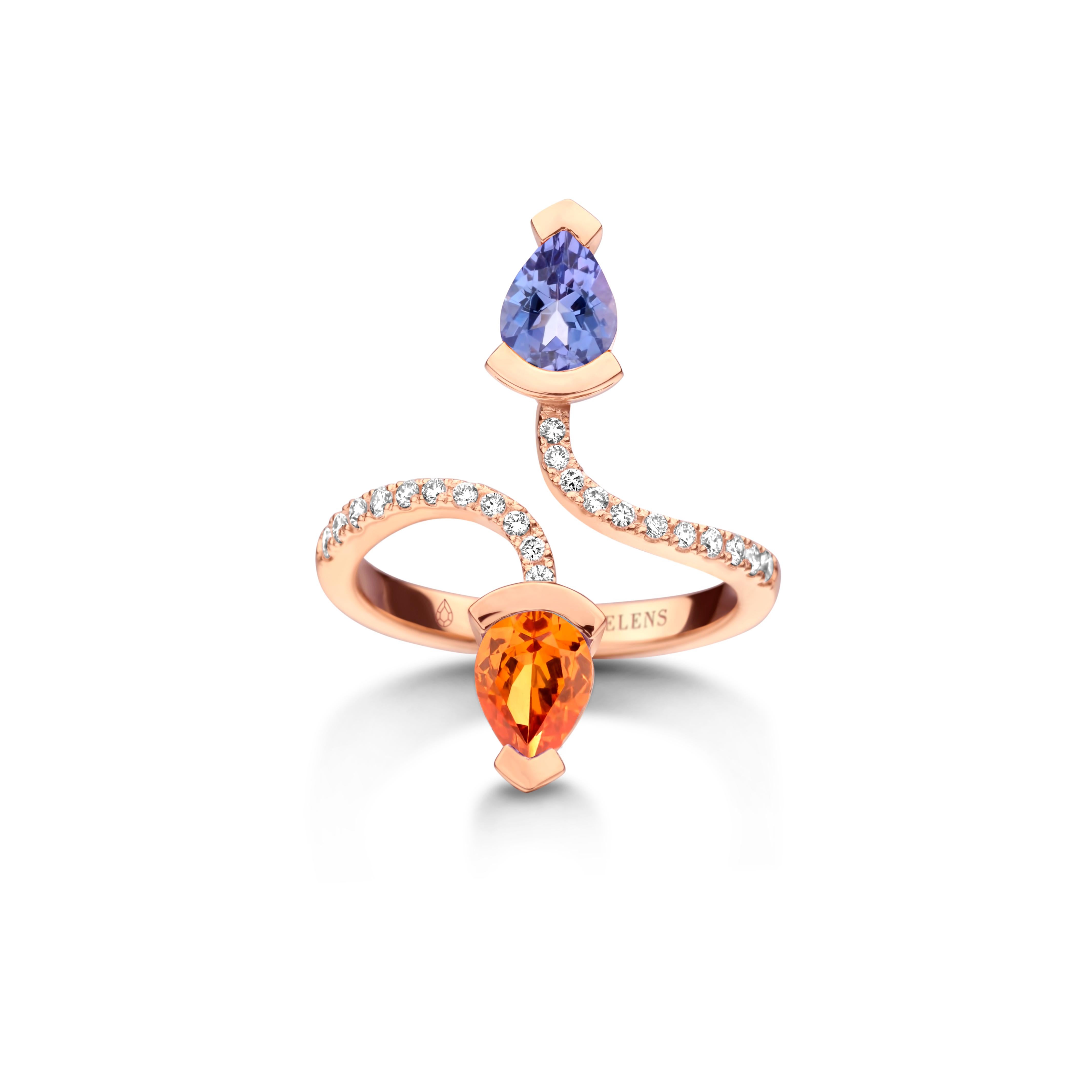 Adeline Duo ring in 18Kt white gold 5g set with a pear-shaped Tanzanite 0,70 Ct, a pear-shaped mandarin garnet 0,70 Ct and 0,19 Ct of white brilliant cut diamonds - VS F quality. Celine Roelens, a goldsmith and gemologist, is specialized in unique,