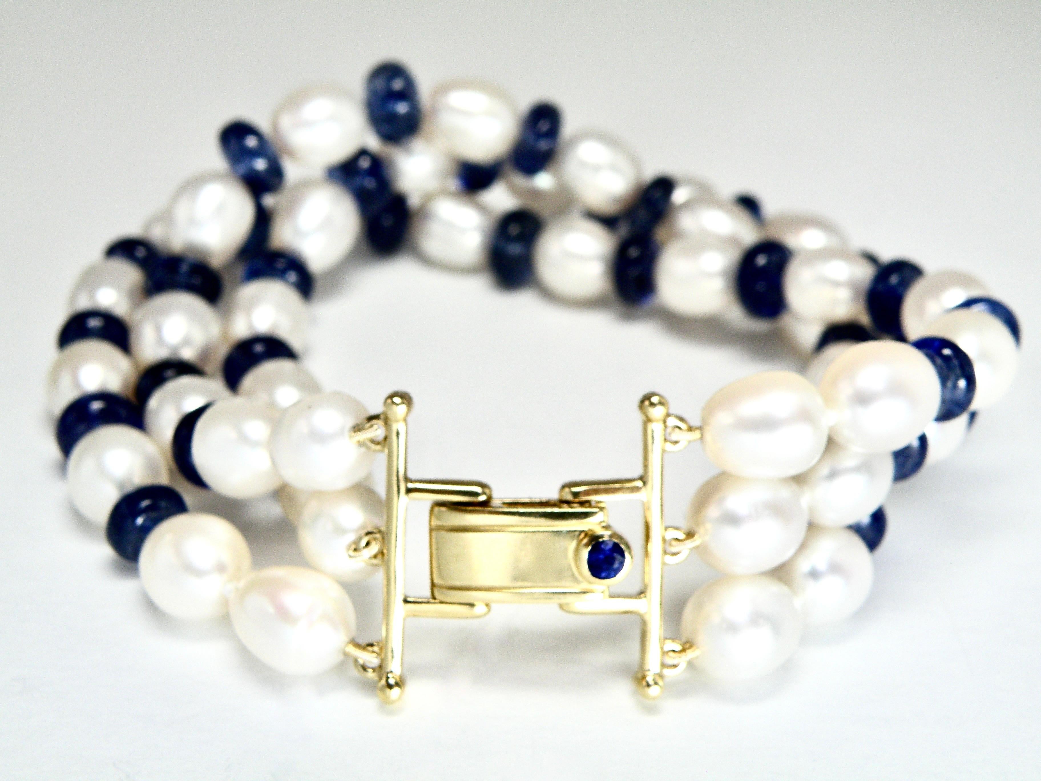 3 stand bracelete of Pearl and tanzanite with sapphire and gold box clasp 