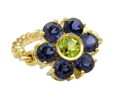 Tanzanite and Peridot Hinged Flower Ring with Rope Band in 18 Karat Yellow Gold
