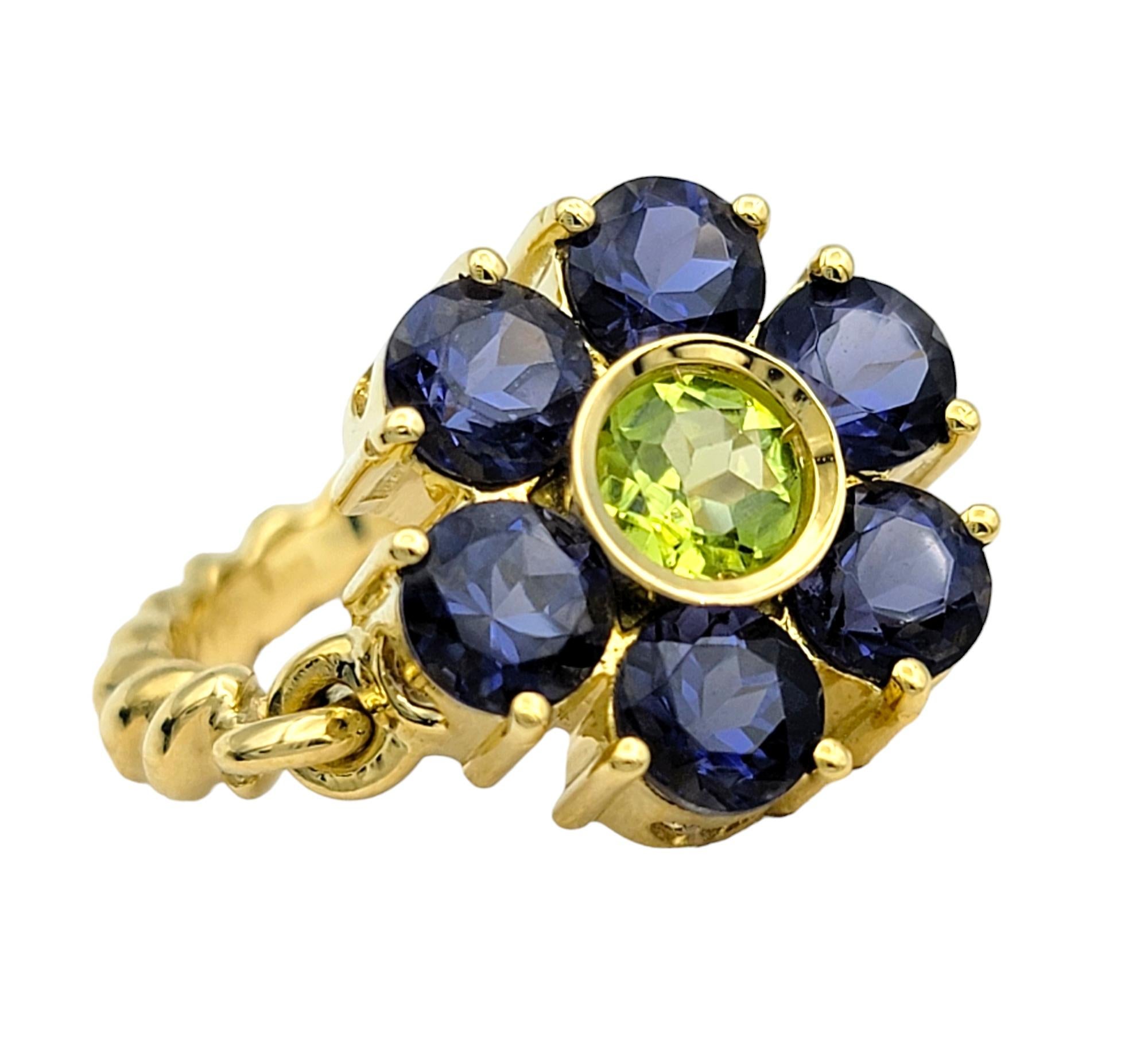 Contemporary Tanzanite and Peridot Hinged Flower Ring with Rope Band in 18 Karat Yellow Gold For Sale