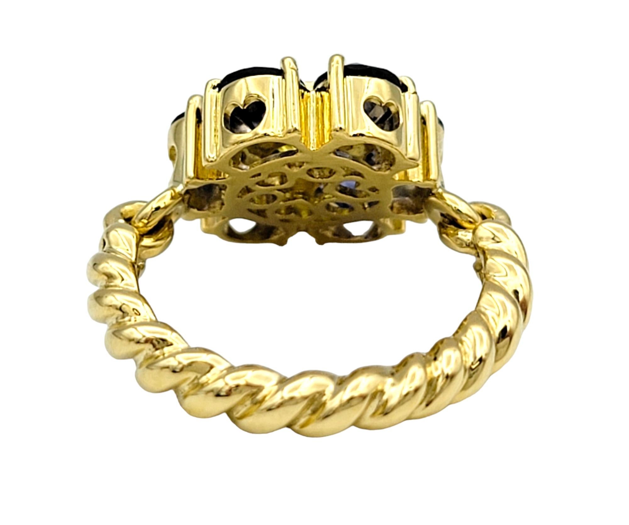 Women's Tanzanite and Peridot Hinged Flower Ring with Rope Band in 18 Karat Yellow Gold For Sale