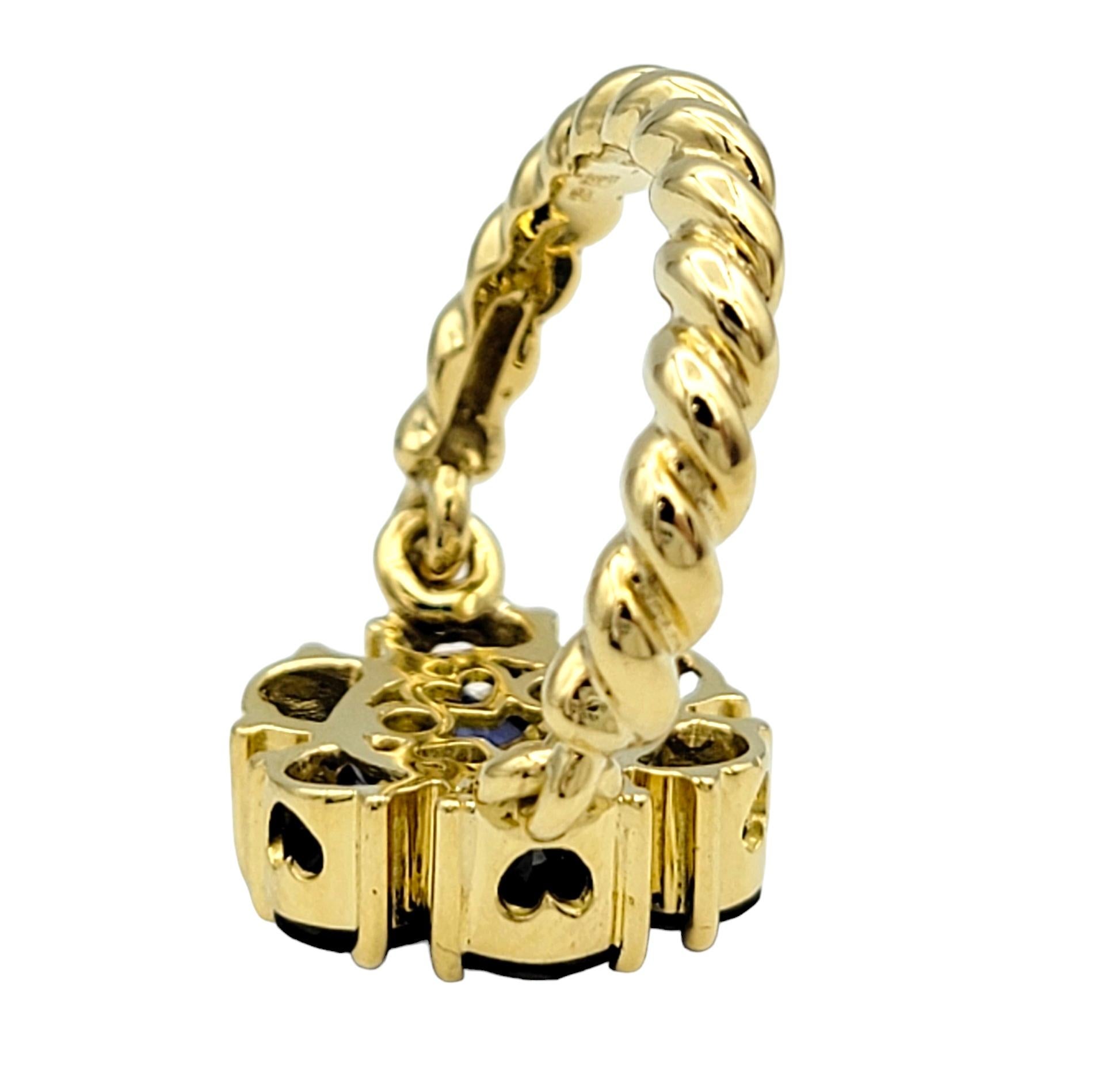 Tanzanite and Peridot Hinged Flower Ring with Rope Band in 18 Karat Yellow Gold For Sale 1