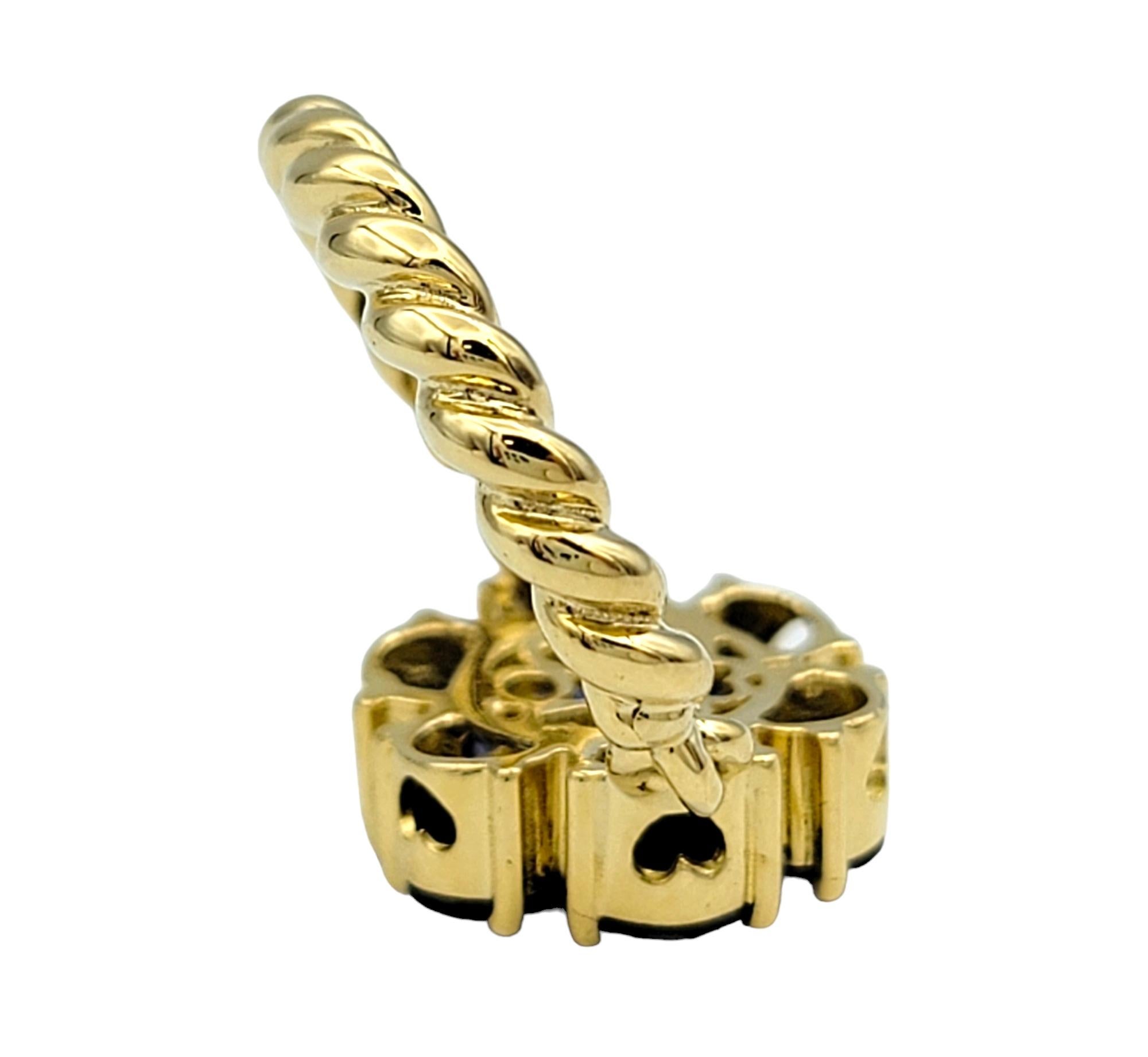 Tanzanite and Peridot Hinged Flower Ring with Rope Band in 18 Karat Yellow Gold For Sale 2