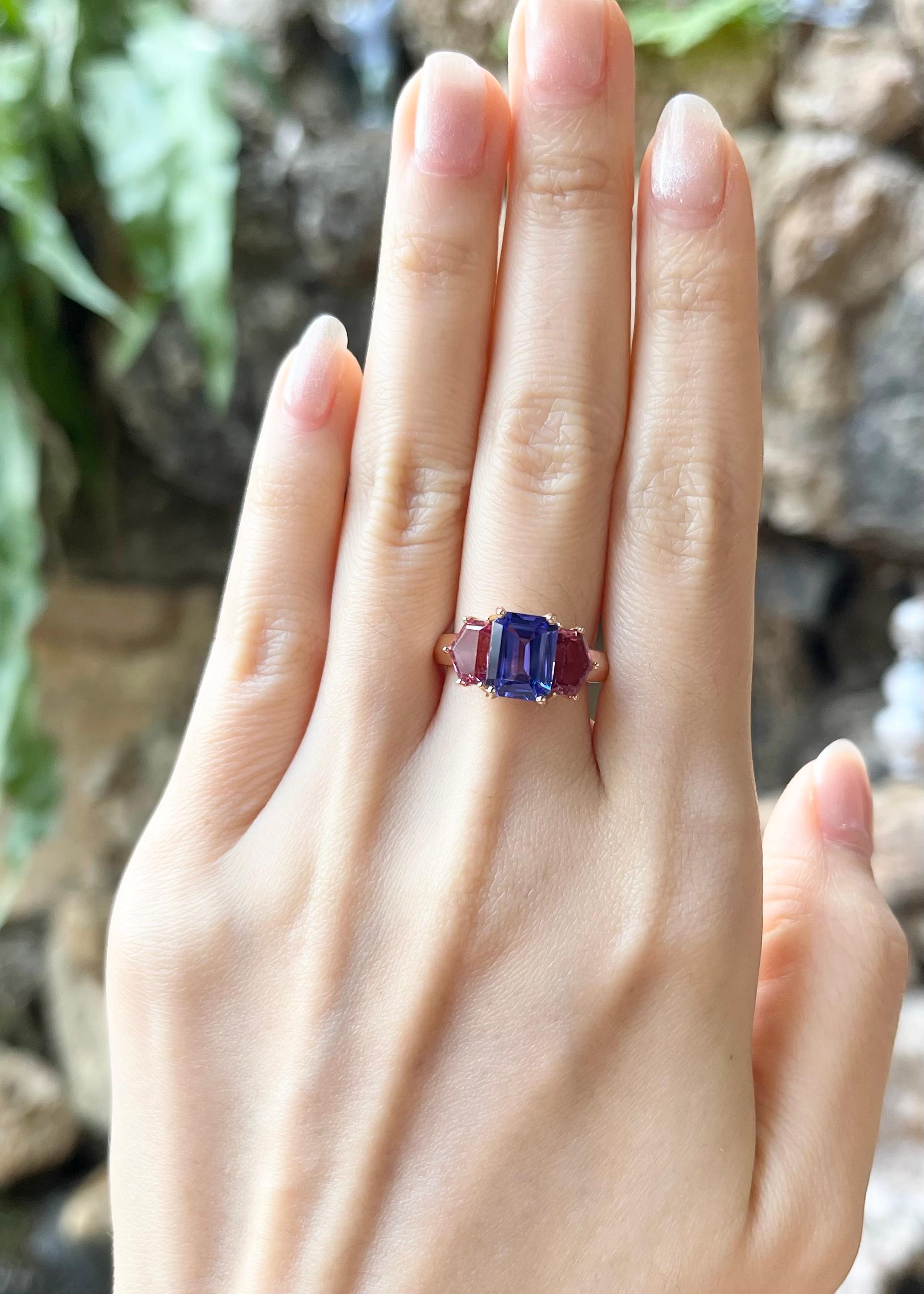 Tanzanite 2.09 carats and Pink Tourmaline 1.92 carats Ring set in 18K Rose Gold Settings

Width:  1.7 cm 
Length: 0.8 cm
Ring Size: 53
Total Weight: 6.2 grams

