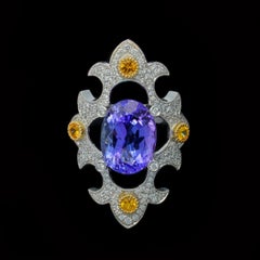 18 Karat White Gold Ring, Tanzanite, Yellow Sapphires, & Diamonds