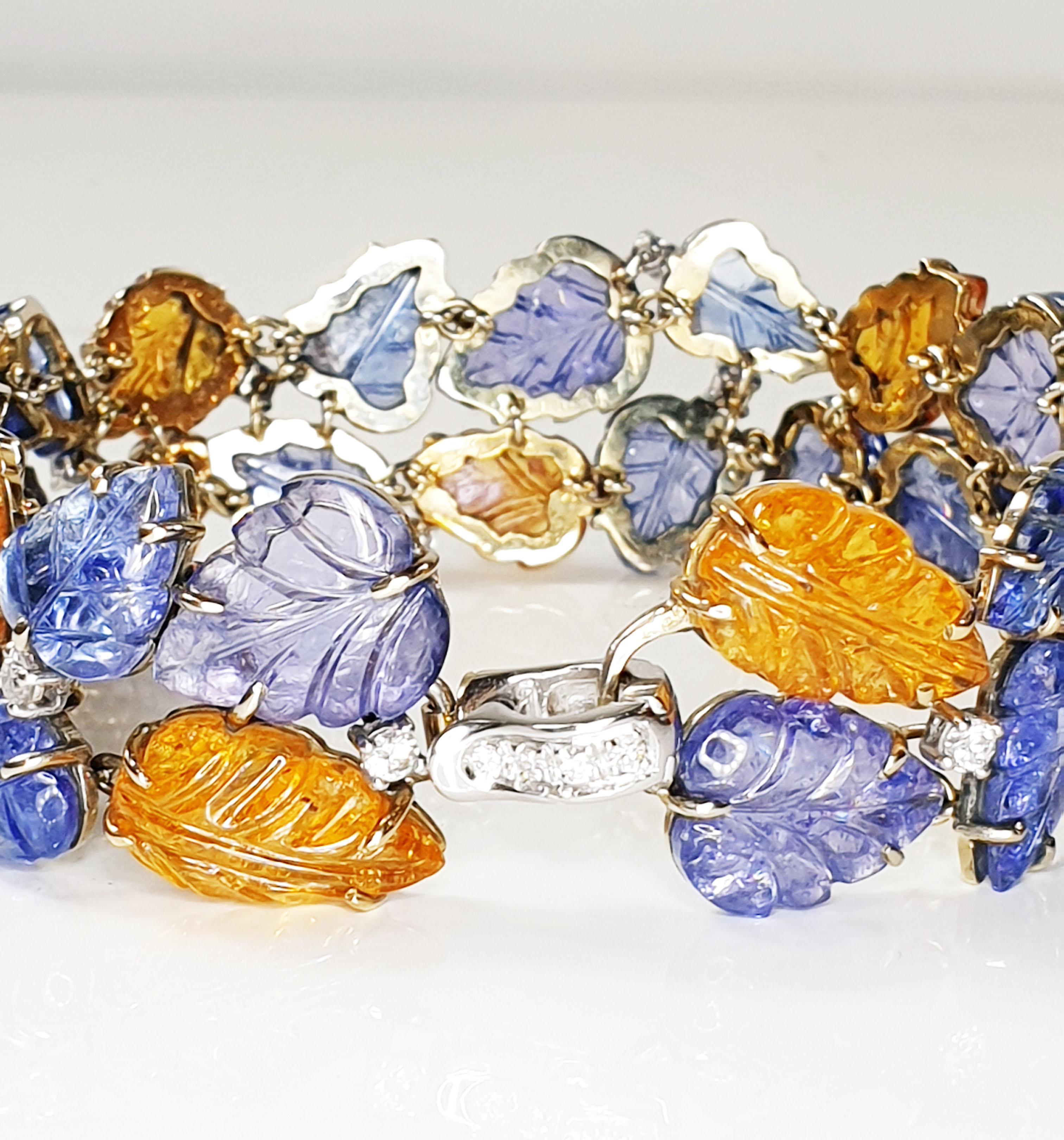 Contemporary Tanzanite and Spessartite Carved Leafs Bracelet in 18k White Gold Diamonds For Sale