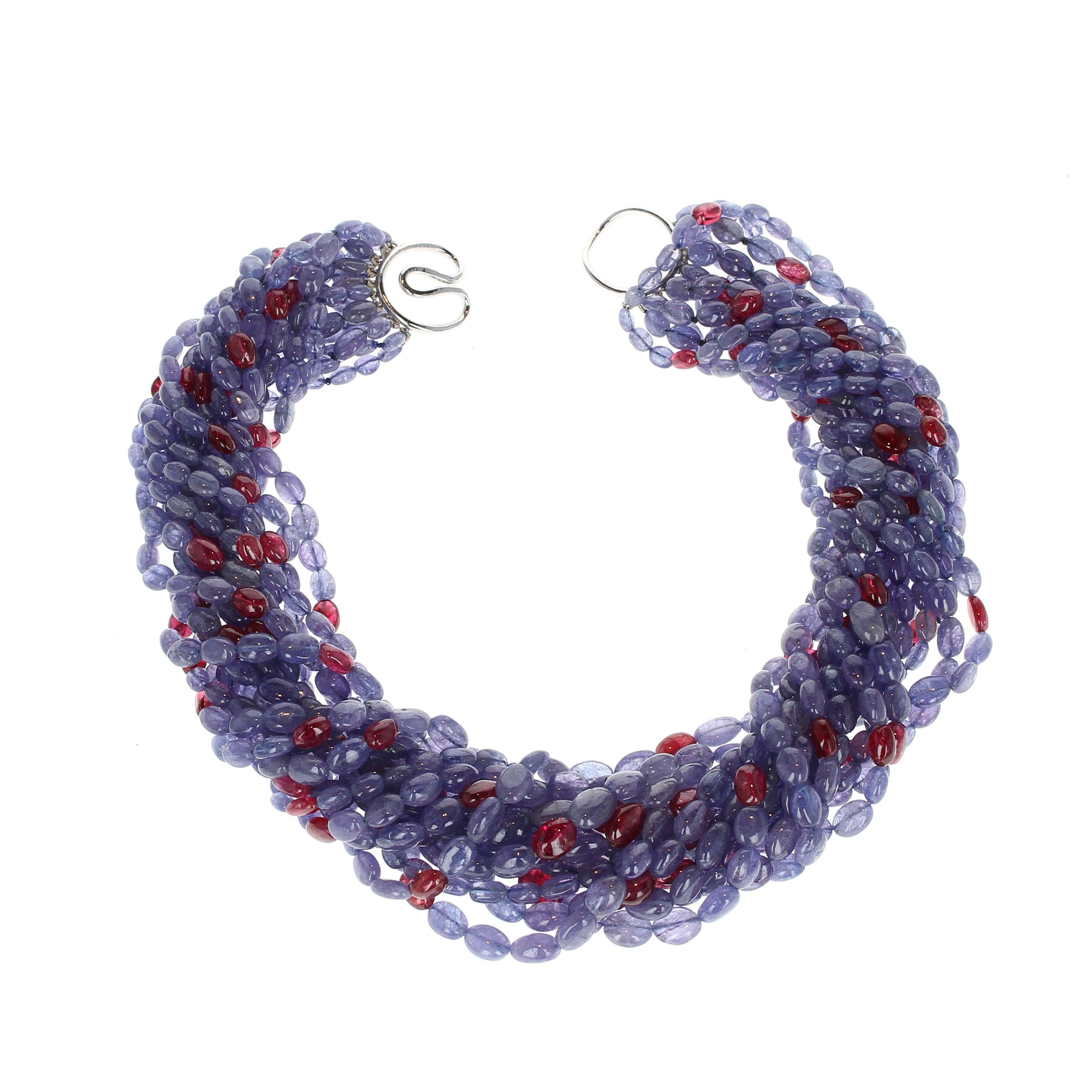 A tanzanite and spinel bead necklace with an 18kt white gold clasp; the total weight of the necklace is approximately 1,123 carats, length 17 inches.