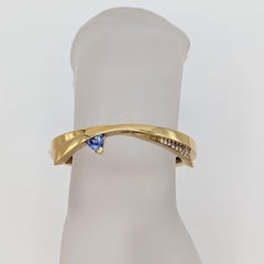 Tansanit und weißer Diamant-Armreif aus 18 Karat Gelbgold