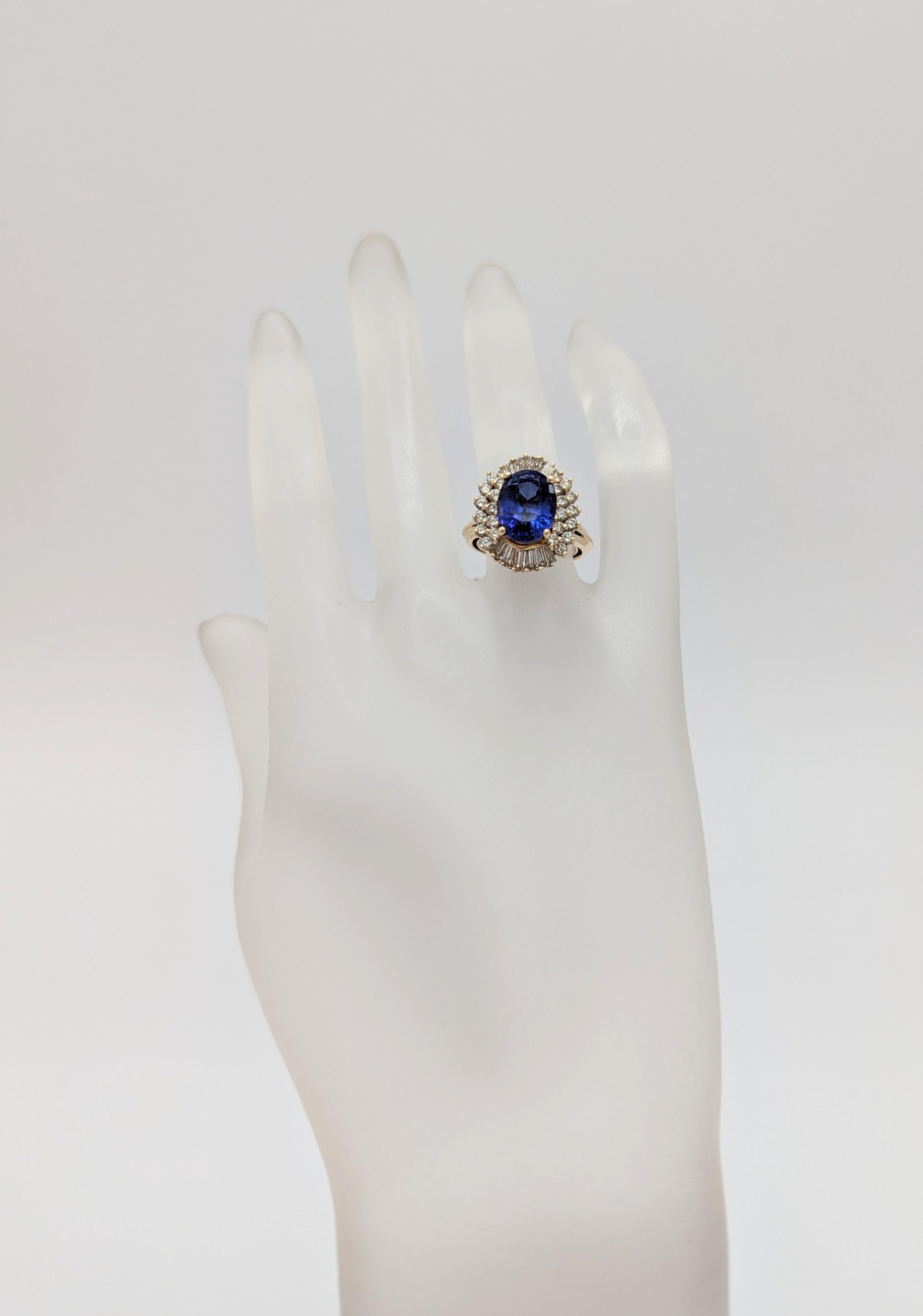 Oval Cut Tanzanite and White Diamond Cocktail Ring in 14K Yellow Gold