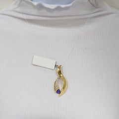 Tansanit und weißer Diamant-Anhänger aus 18 Karat Gelbgold