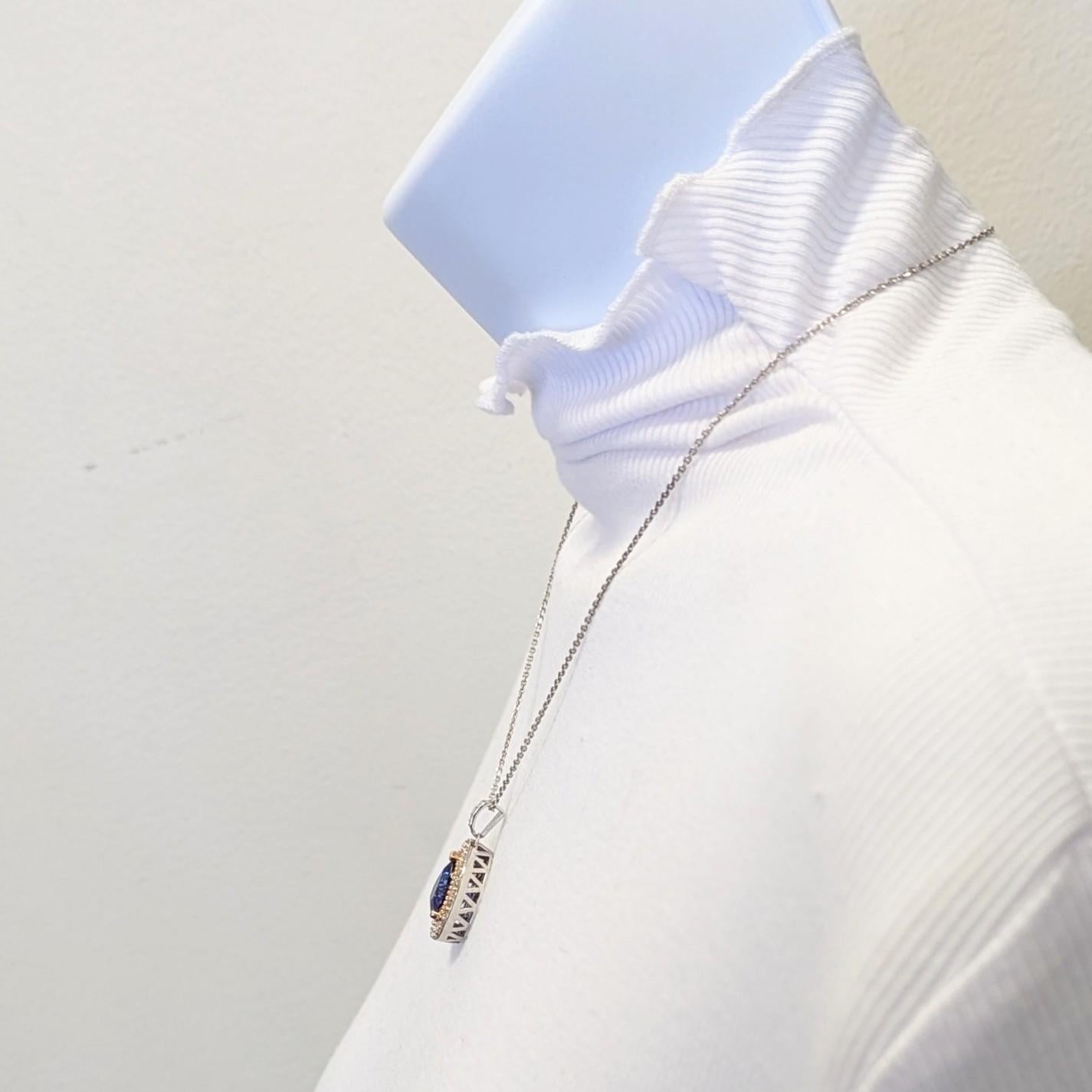 Pear Cut Tanzanite and White Diamond Pendant Necklace in 14K 2 Tone Gold For Sale