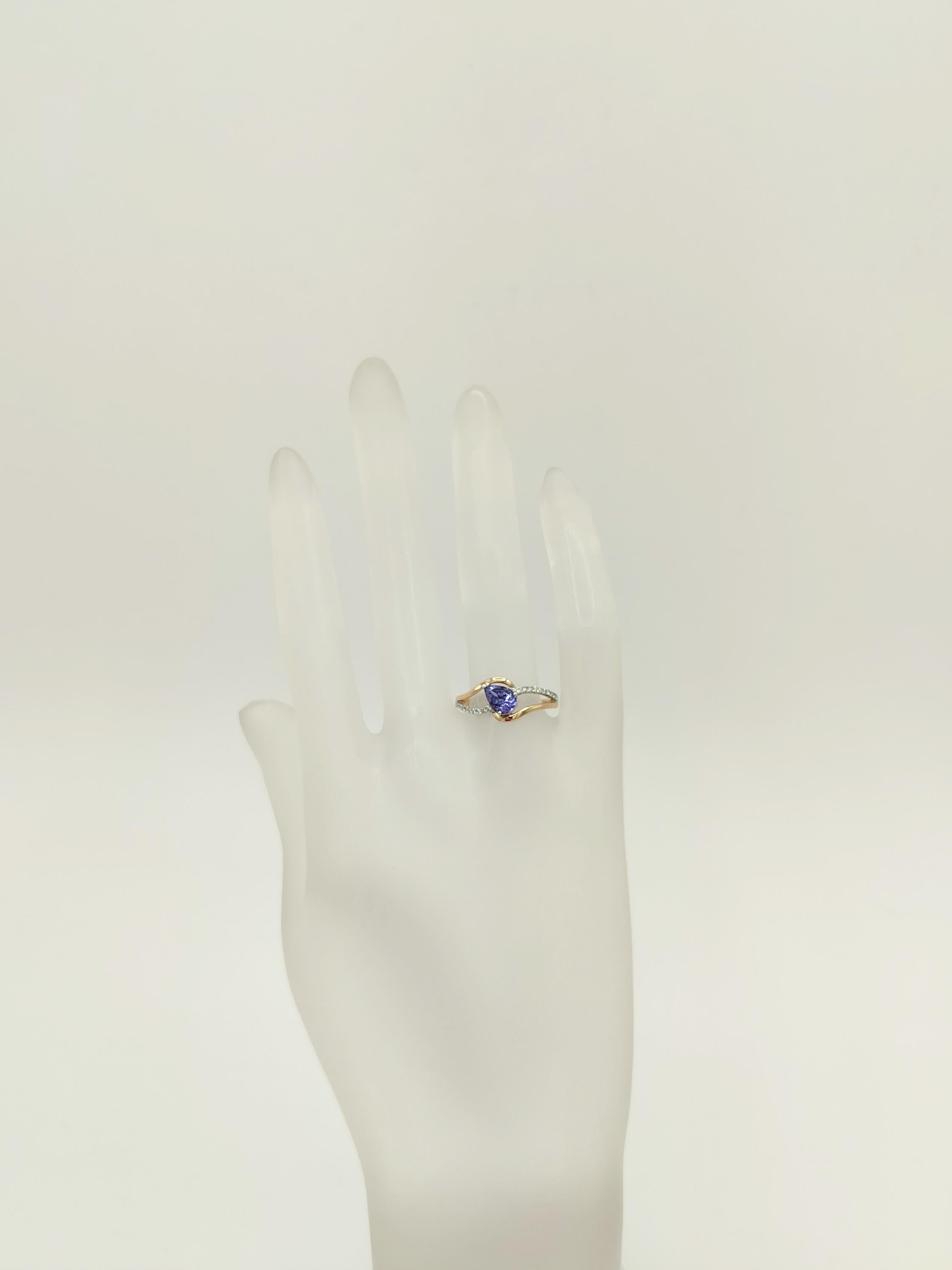 Pear Cut Tanzanite and White Diamond Ring in 14K 2 Tone Gold For Sale