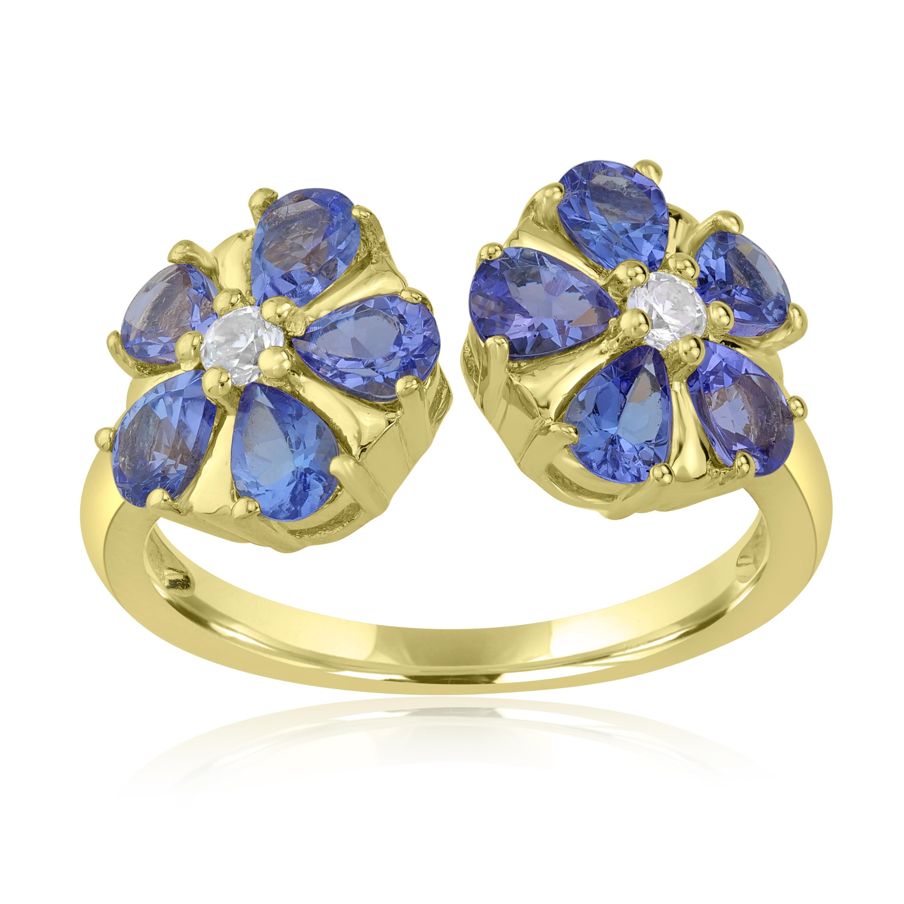 Adorn your finger with pretty blooms. Featured with 10 pear cut tanzanites with round 2 white natural zircon arranged in flowers. This womens flower cuff ring is crafted in genuine 925 sterling silver and is nickel free. This ring comes with a 14k