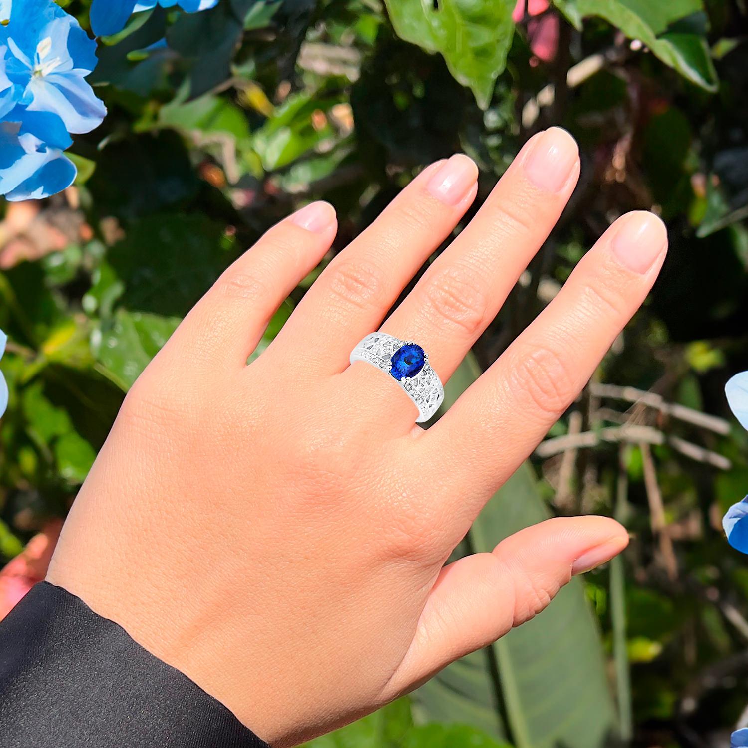 Contemporary Tanzanite Band Ring With Diamonds 18K White Gold For Sale