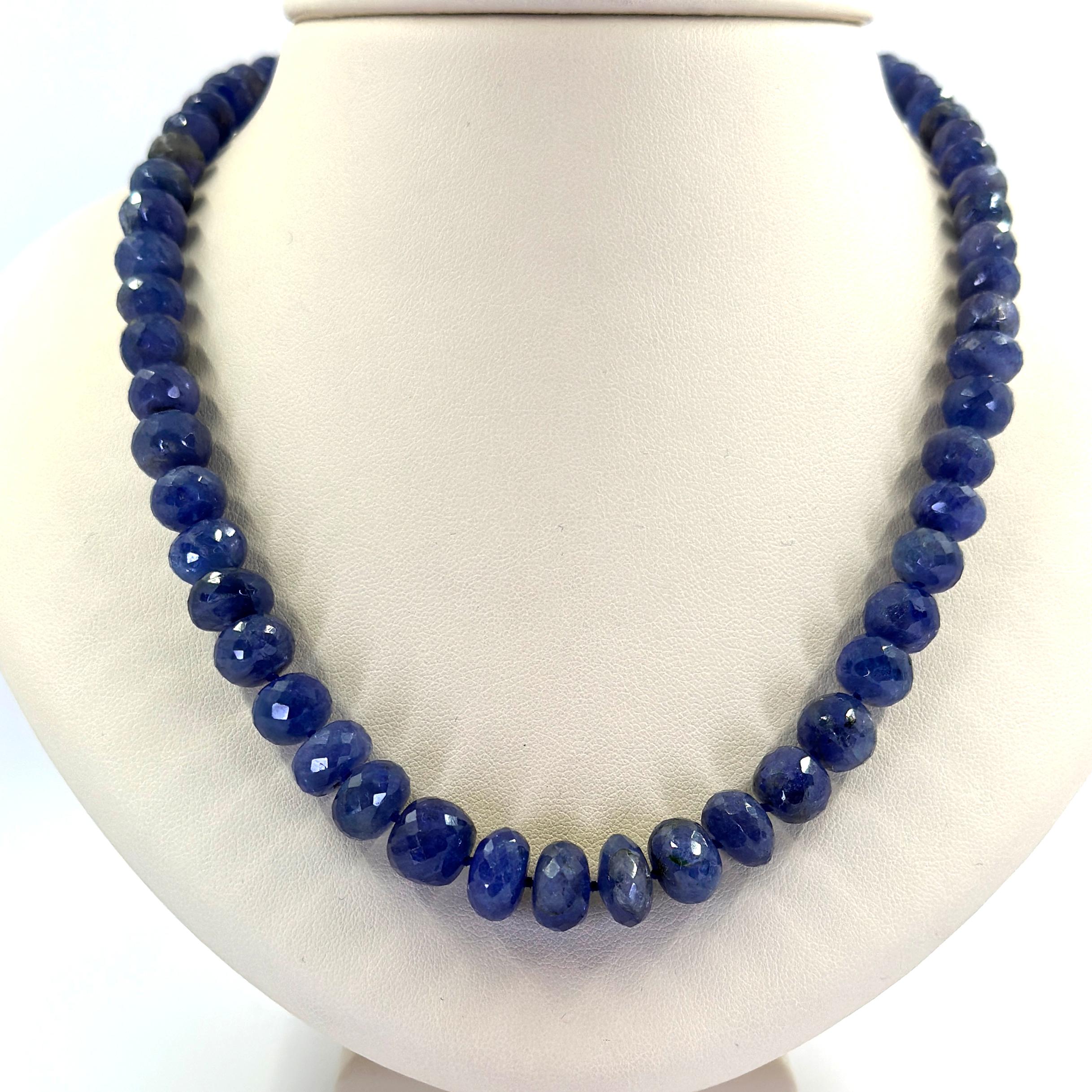 245 Carat Total Weight Faceted Tanzanite Bead Necklace Featuring a 14 Karat Yellow Gold Pearl Clasp. 72 Beads Measure 6-10mm and 18 Inches Long.