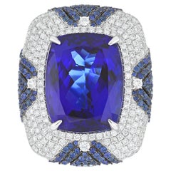 Anillo de oro blanco de 18 quilates con tanzanita, zafiro azul y diamantes