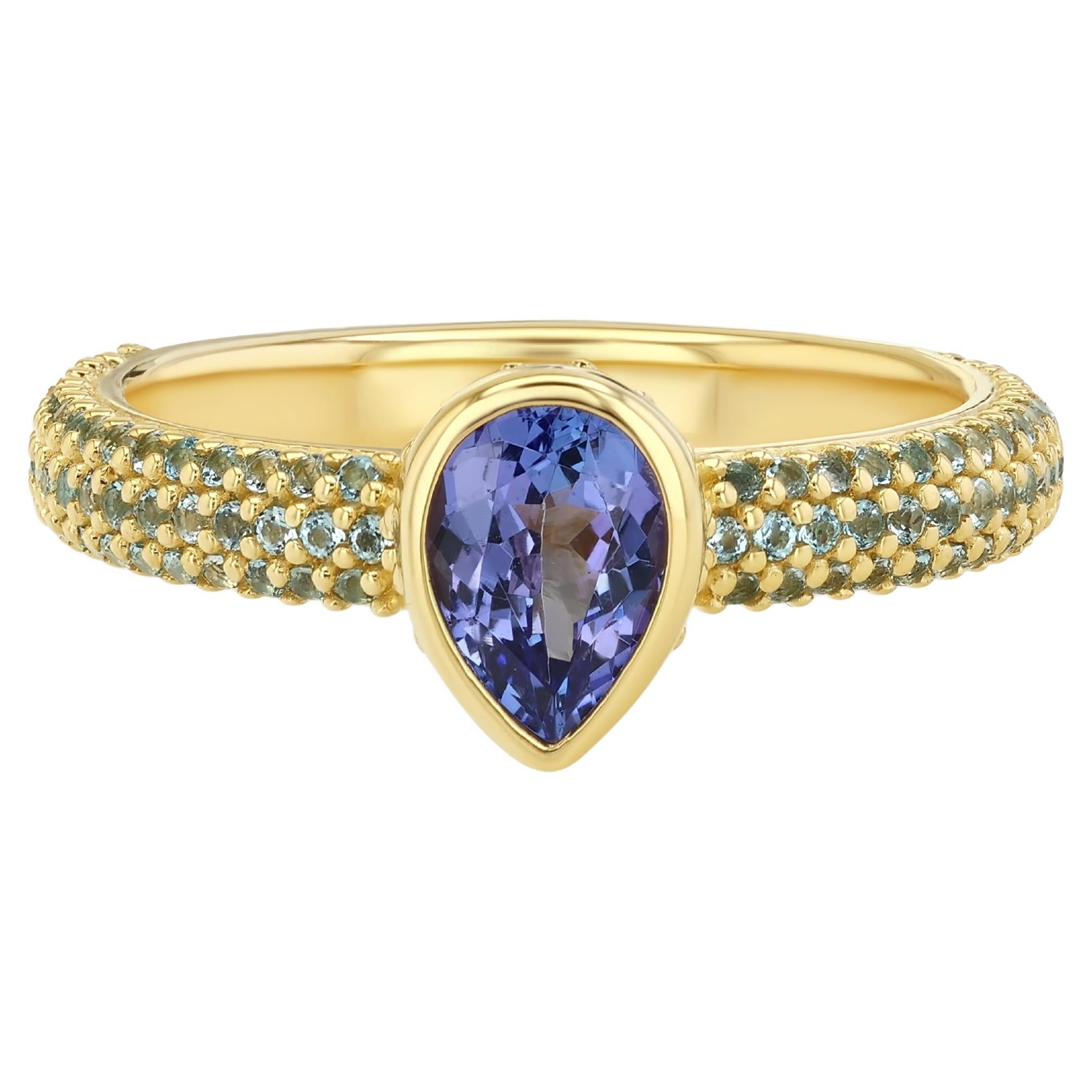 Anillo de tanzanita y topacio azul en venta