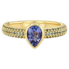 Anello con tanzanite e topazio blu