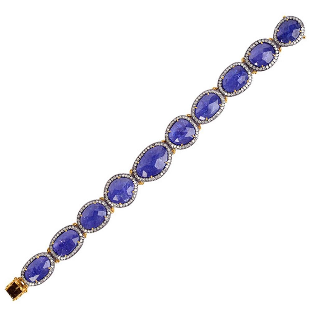 Oval Cut Tanzanite Bracelet with Pave Diamonds Made in 18k Gold & Silver For Sale