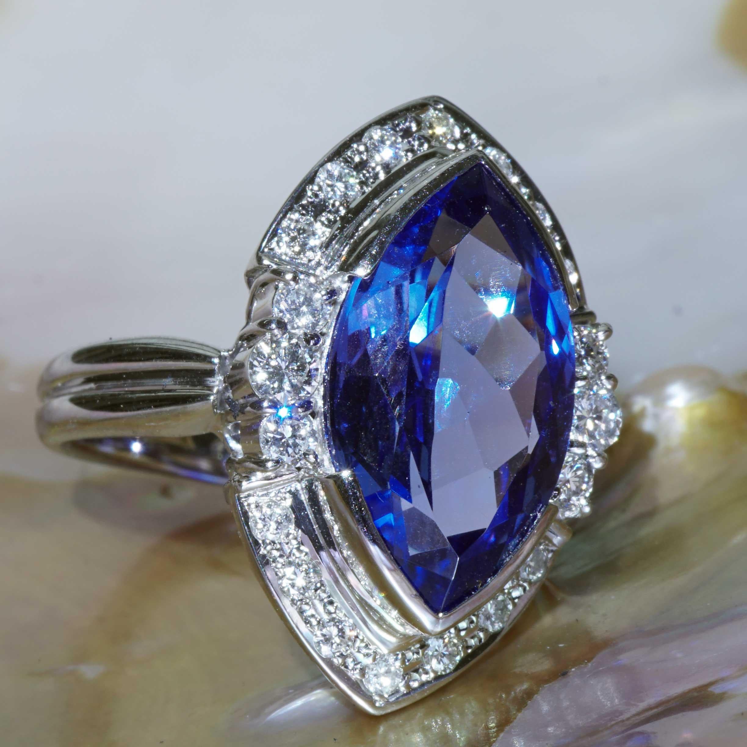 ...navetteshaped Star of Africa....Ring in 900 platinum, navette cut tanzanite of approx. 6.42 ct, fine blue, slight violet tint, just as a tanzanite should be, approx. 18 x 9.5 mm, safe and protected by two partially open chatons, full-cut