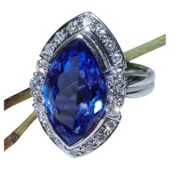 Tanzanite Brilliant Ring 900 Platinum 6.42 ct 0.50 ct Star of Africa in Marquise