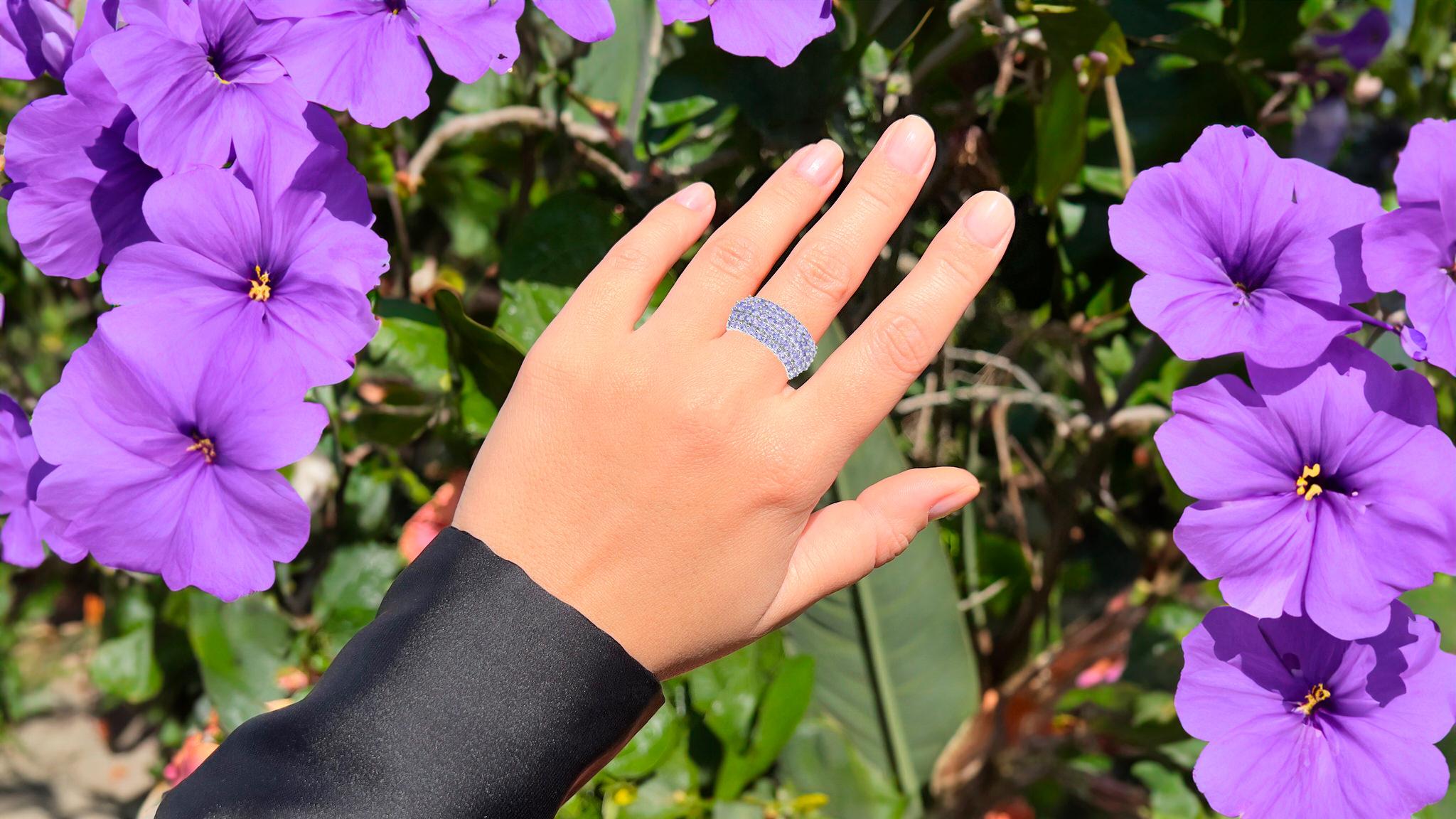 It comes with the Gemological Appraisal by GIA GG/AJP
Round Tanzanites = 2.05 Carats
Total Quantity: 59 Gemstones
Metal: Rhodium Plated Sterling Silver
Ring Size: 7* US
*It can be resized complimentary