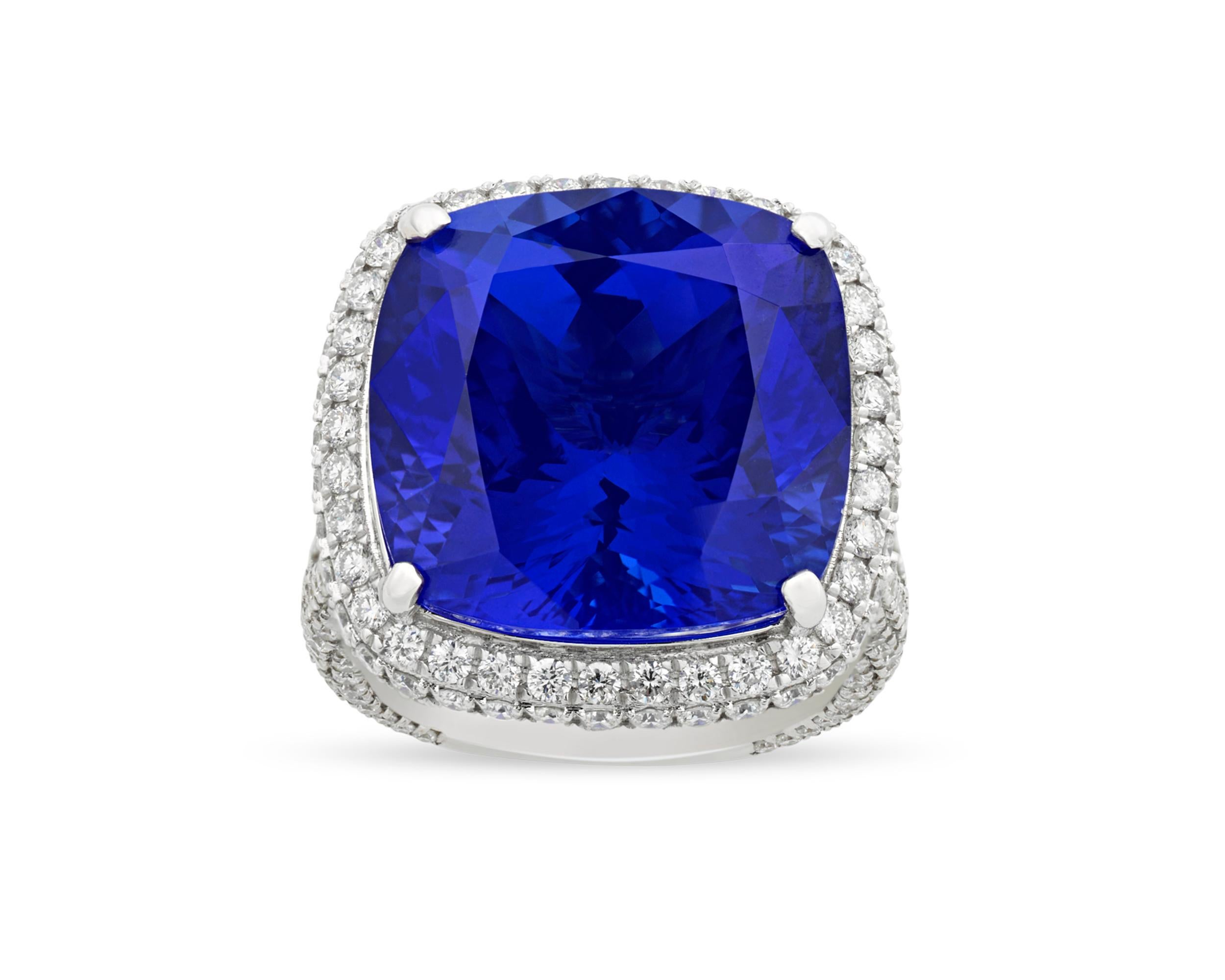 The monumental 22.43-carat cushion-cut tanzanite in this convertible ring displays the incredible deep violetish-blue hue for which tanzanites are so desired. The rare gemstone has been certified by the American Gemological Institute (AGL) to be