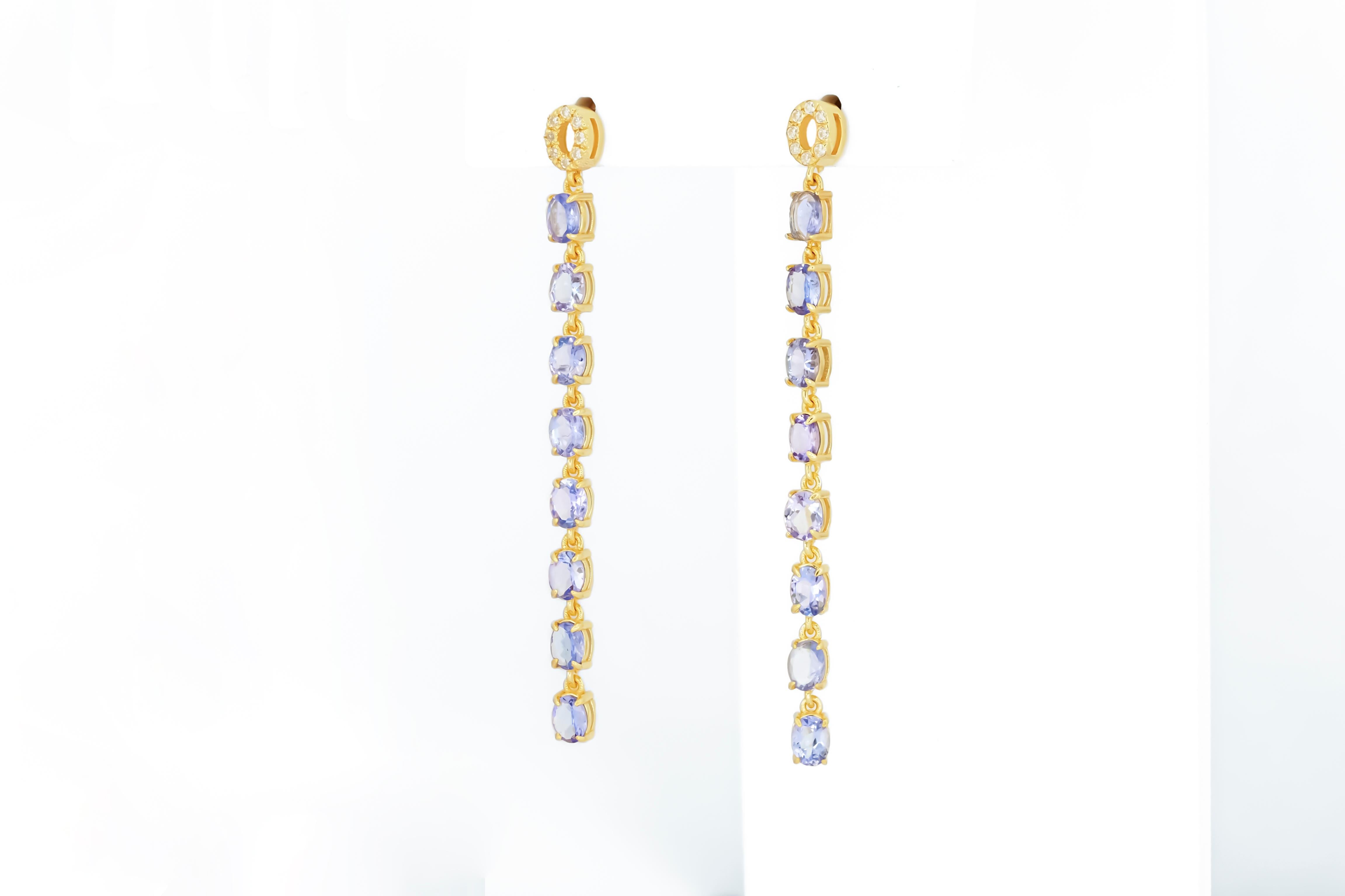 Oval Cut Tanzanite dangle earrings studs in 14k gold.  For Sale