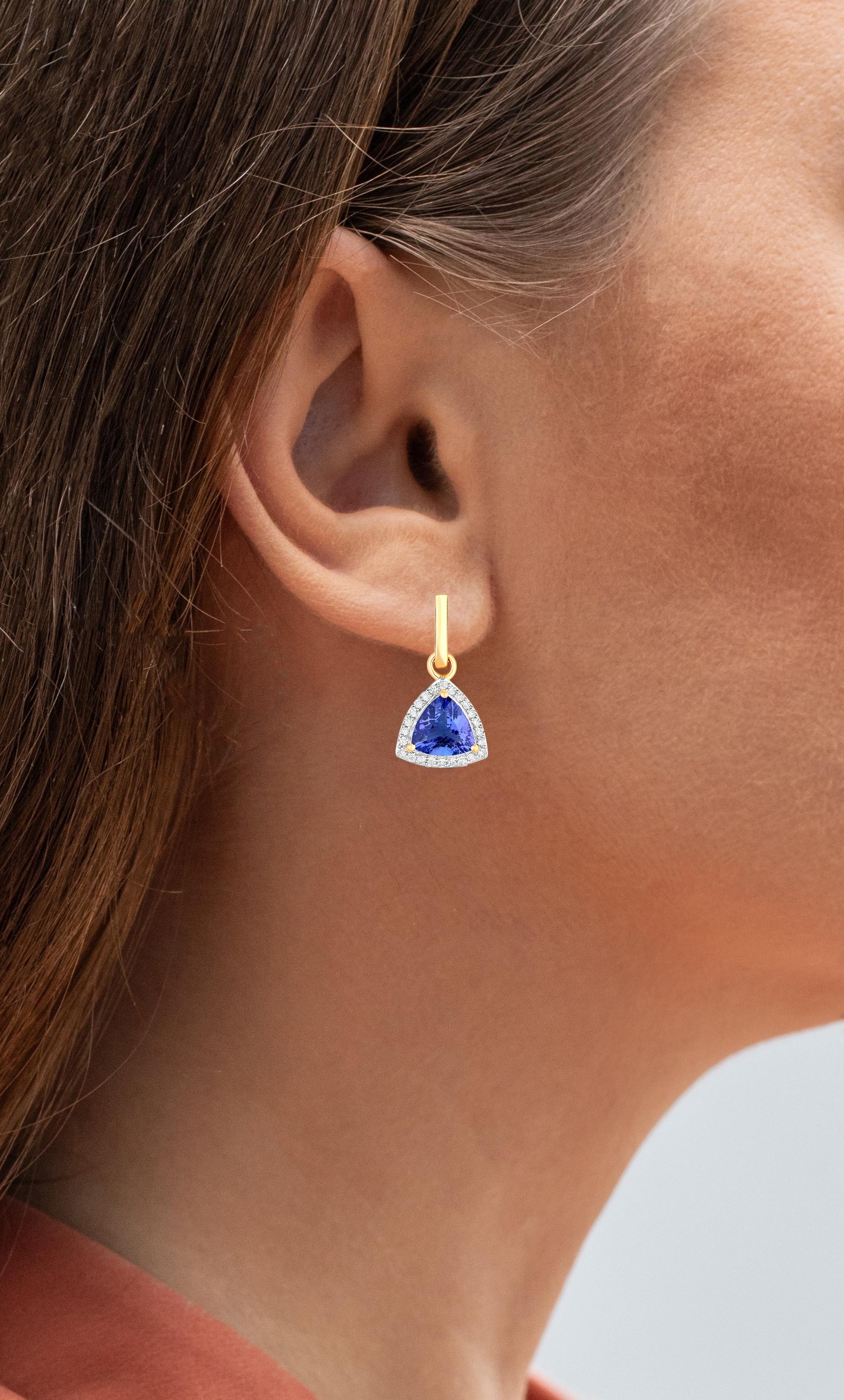 It comes with the appraisal by GIA GG/AJP
All Gemstones are Natural
2 Trillion Tanzanites  = 3.48 Carats
48 Diamonds = 0.38 Carats
Metal: 14K Yellow Gold
Dimensions: 23 x 12 mm
