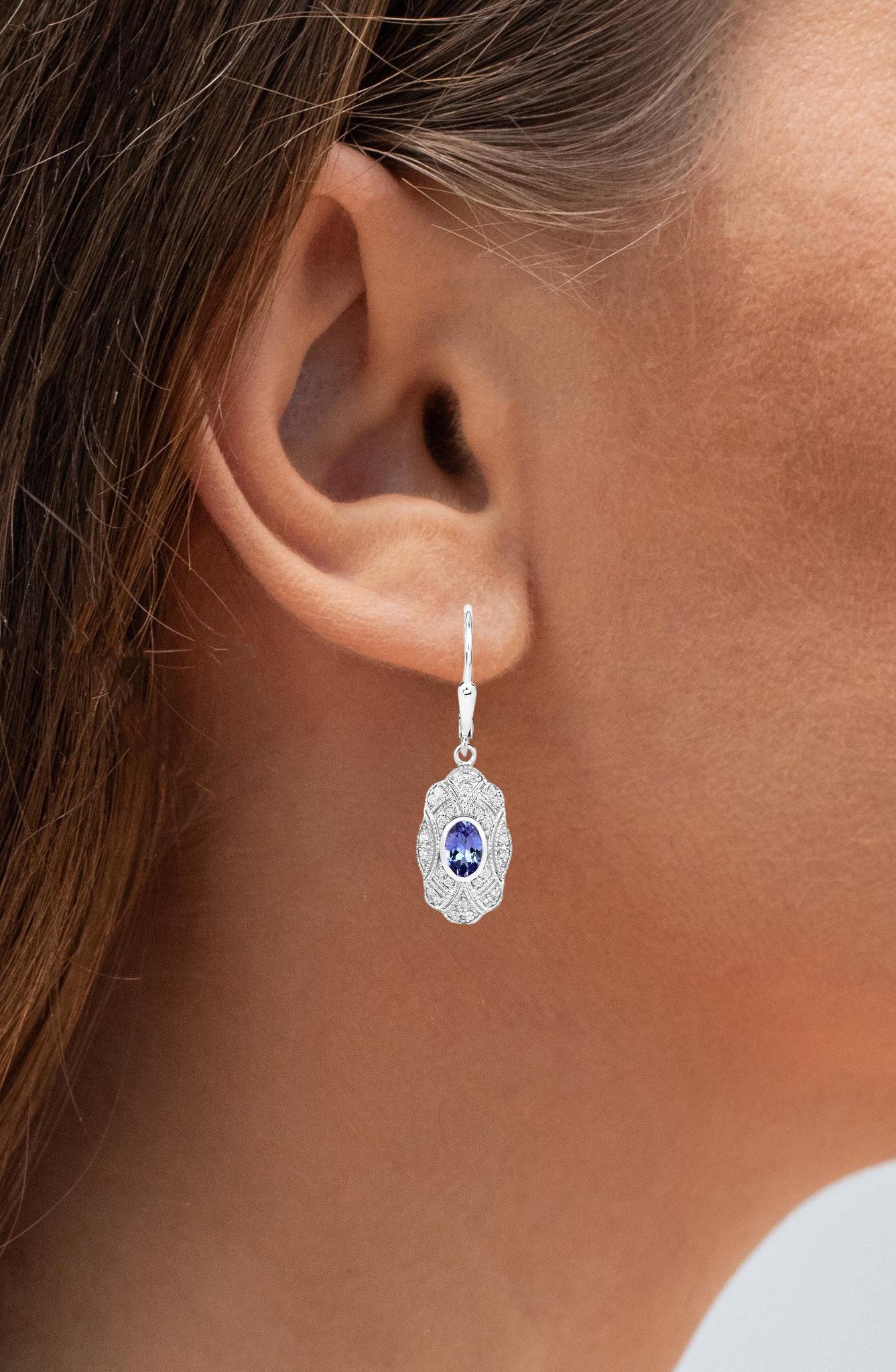 Contemporary Tanzanite Dangle Earrings With White Topaz 1.16 Carats For Sale