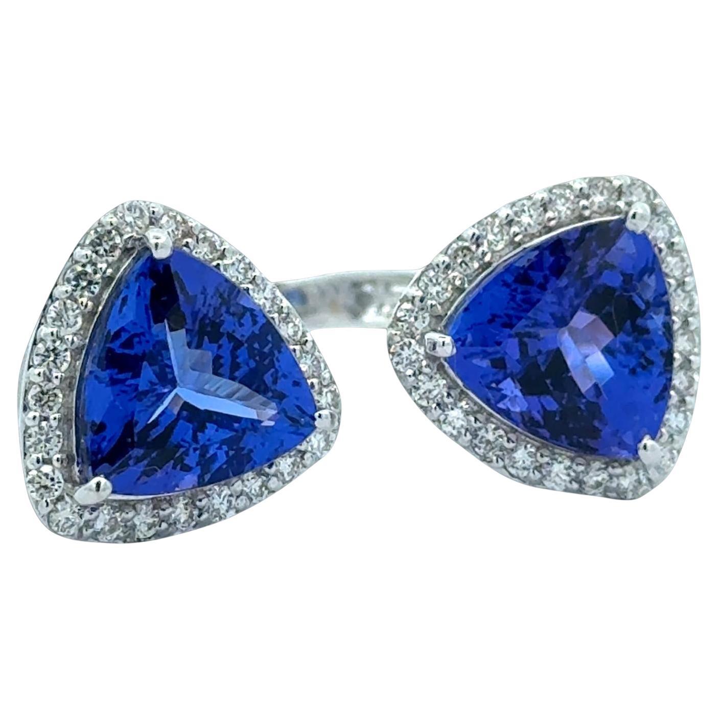 Anello con tanzanite, diamanti e oro bianco 18K