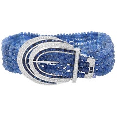 Armband aus 18 Karat Weißgold mit Tansaniten, Diamanten und Saphiren