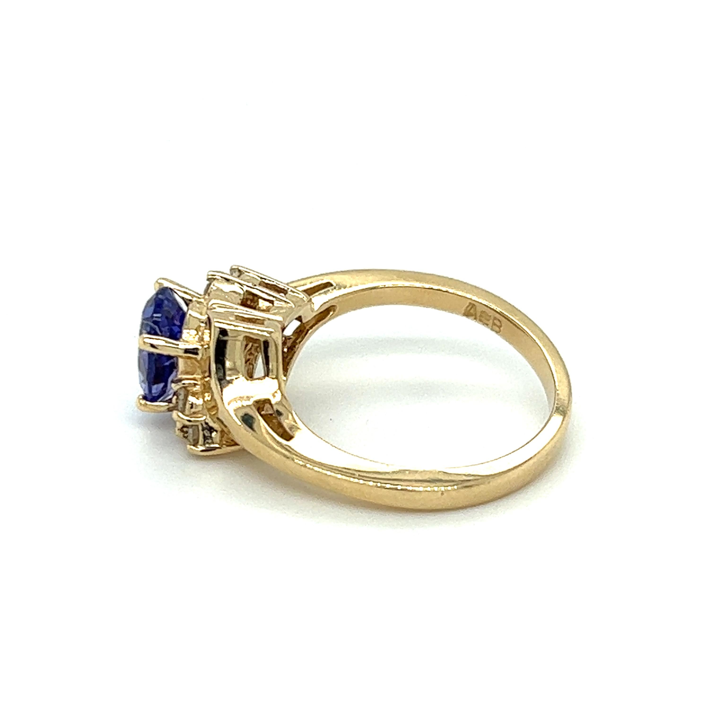 Contemporary Tanzanite & Diamond Bypass Design Ring in 14K Yellow Gold