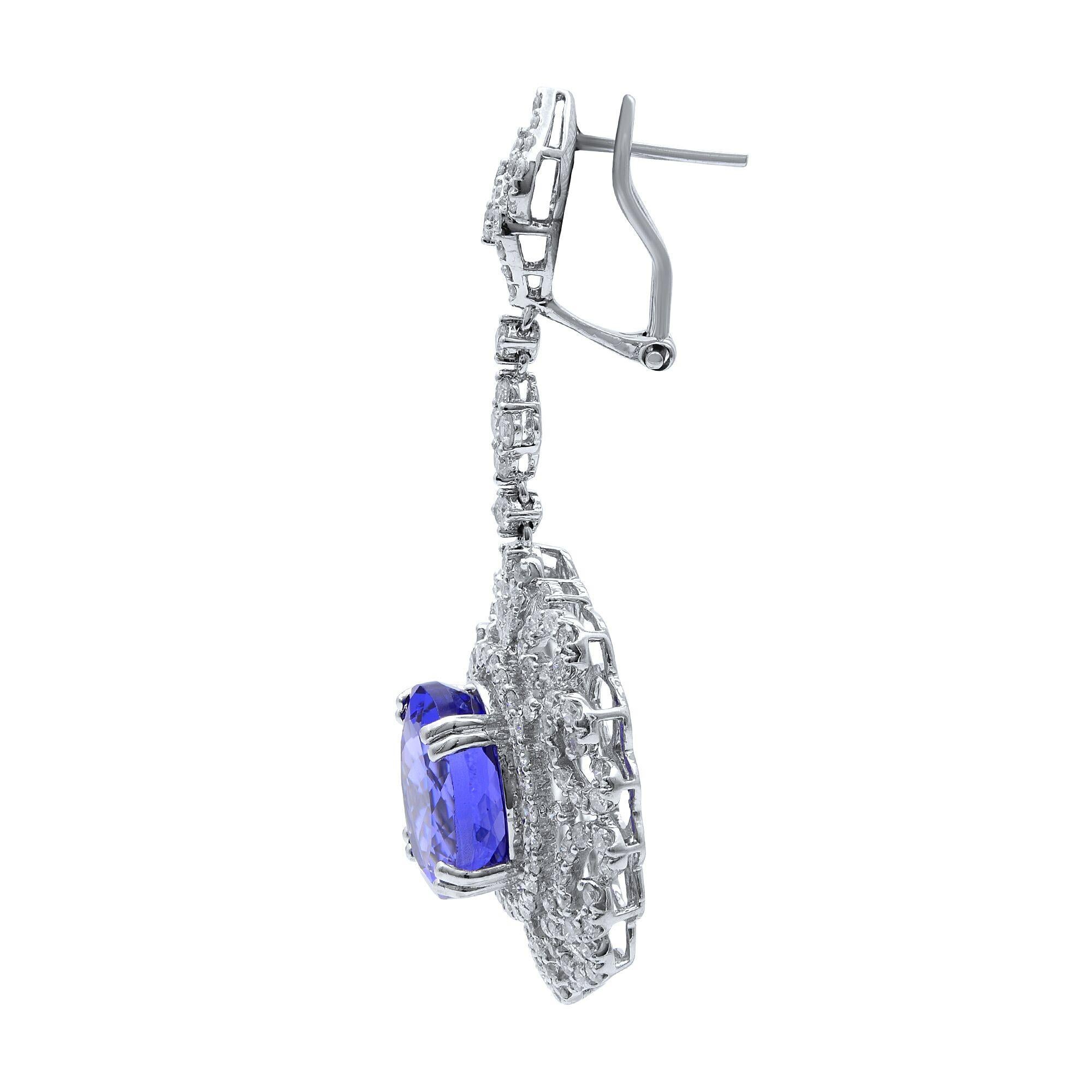 Tanzanite Diamond Chandelier Drop Earrings 18K White Gold 

Measuring an impressive 2 inches long, these fabulous tanzanite and diamond drop chandalier earrings look as though they were taken straight from a palace oil portrait. Magnificently hand