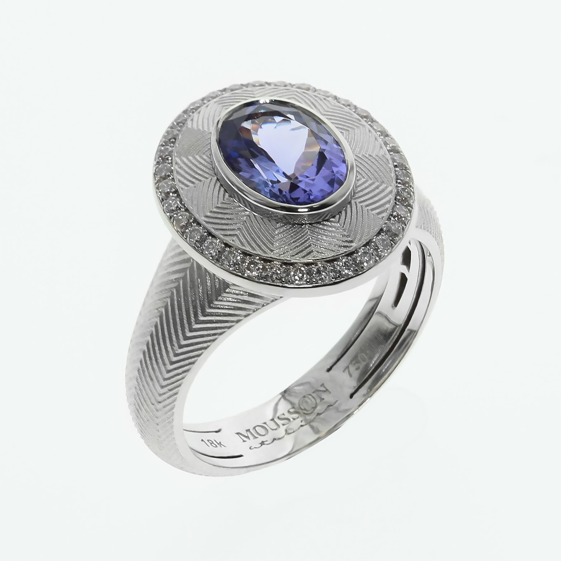 Tanzanite Diamond Classical 18 Karat White Gold Ring

Our Trademark Texture 